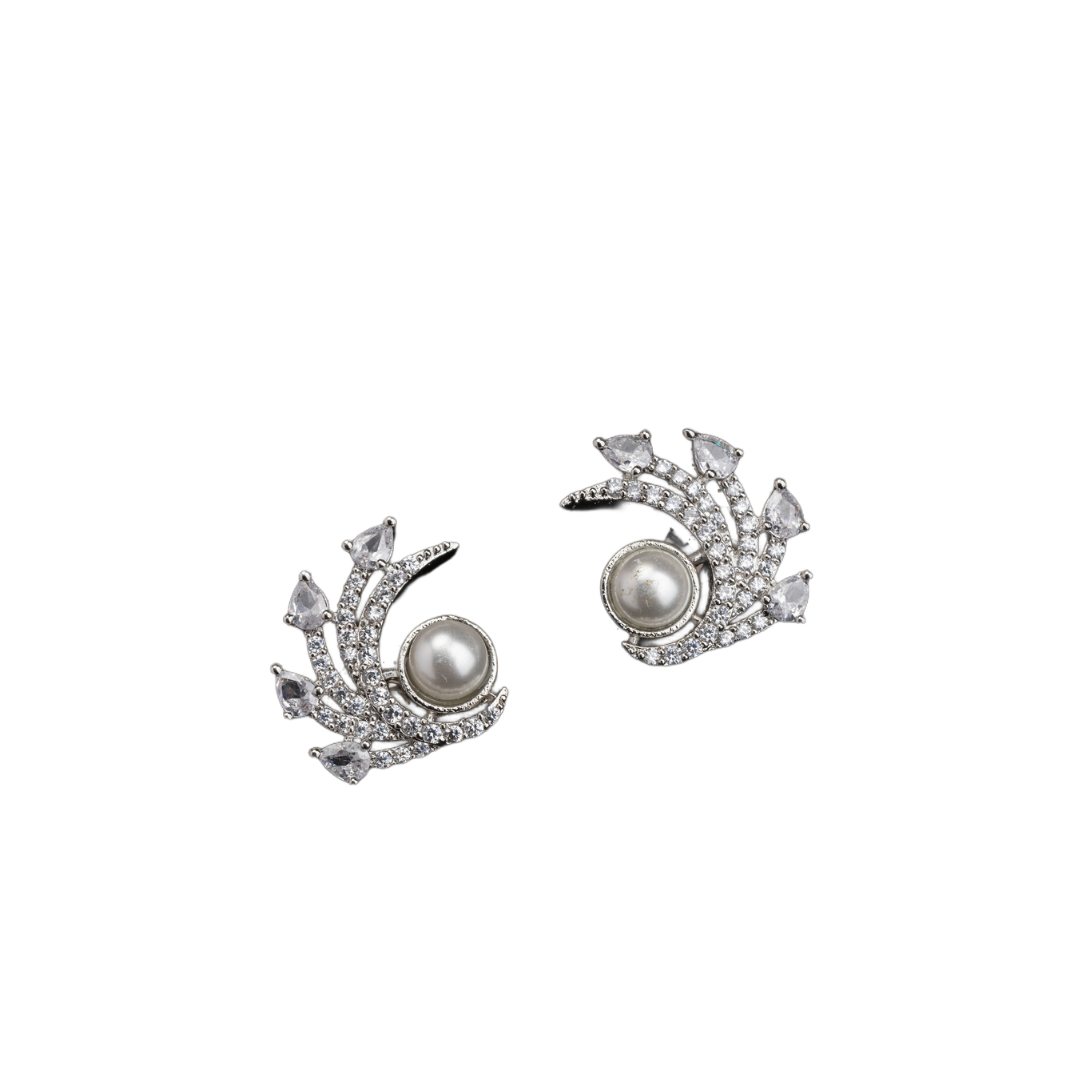 "Zircon studs with a single pearl offer sparkling brilliance and classic, sophisticated elegance."