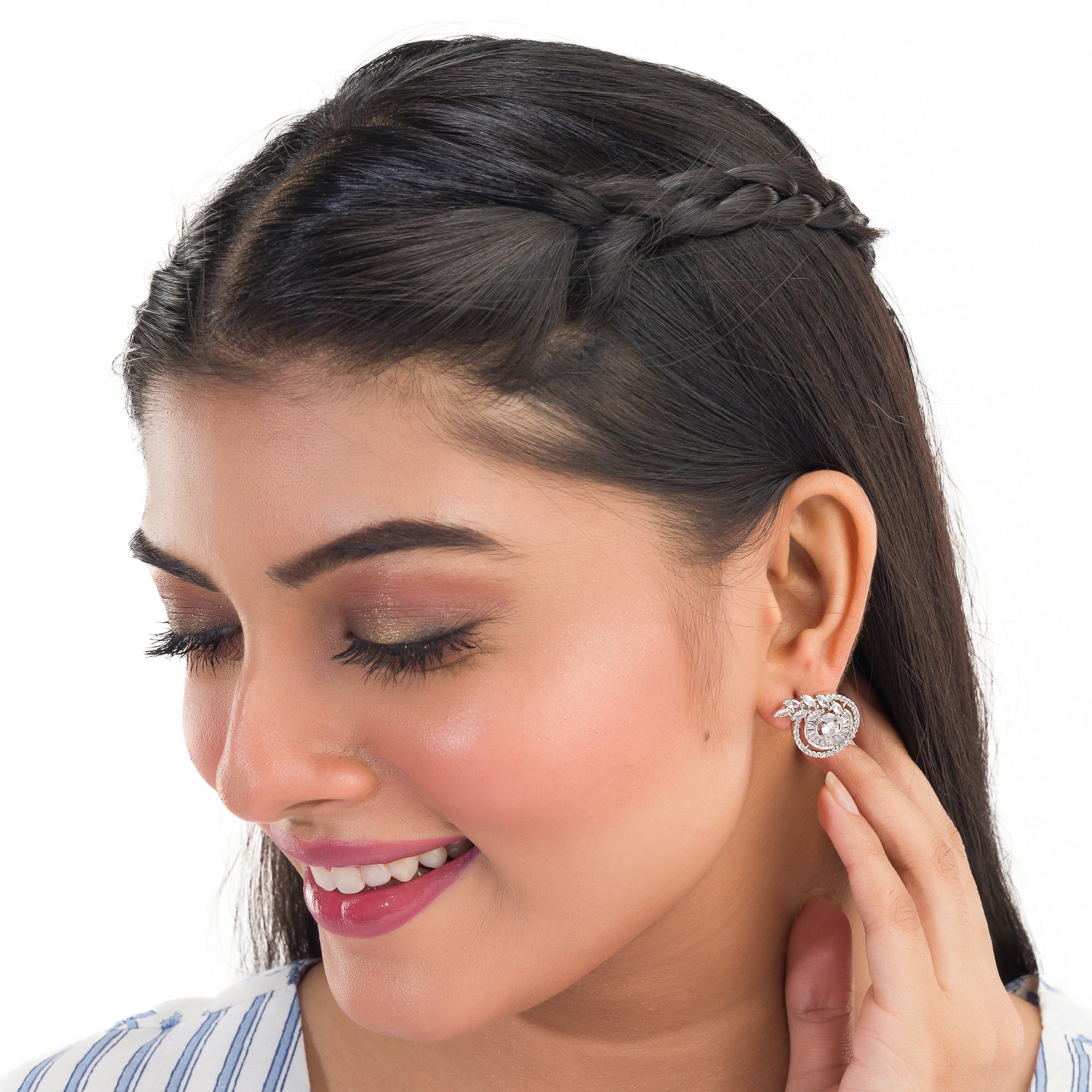 "Round and leaf zircon earrings combine sparkling beauty with nature-inspired, elegant charm."