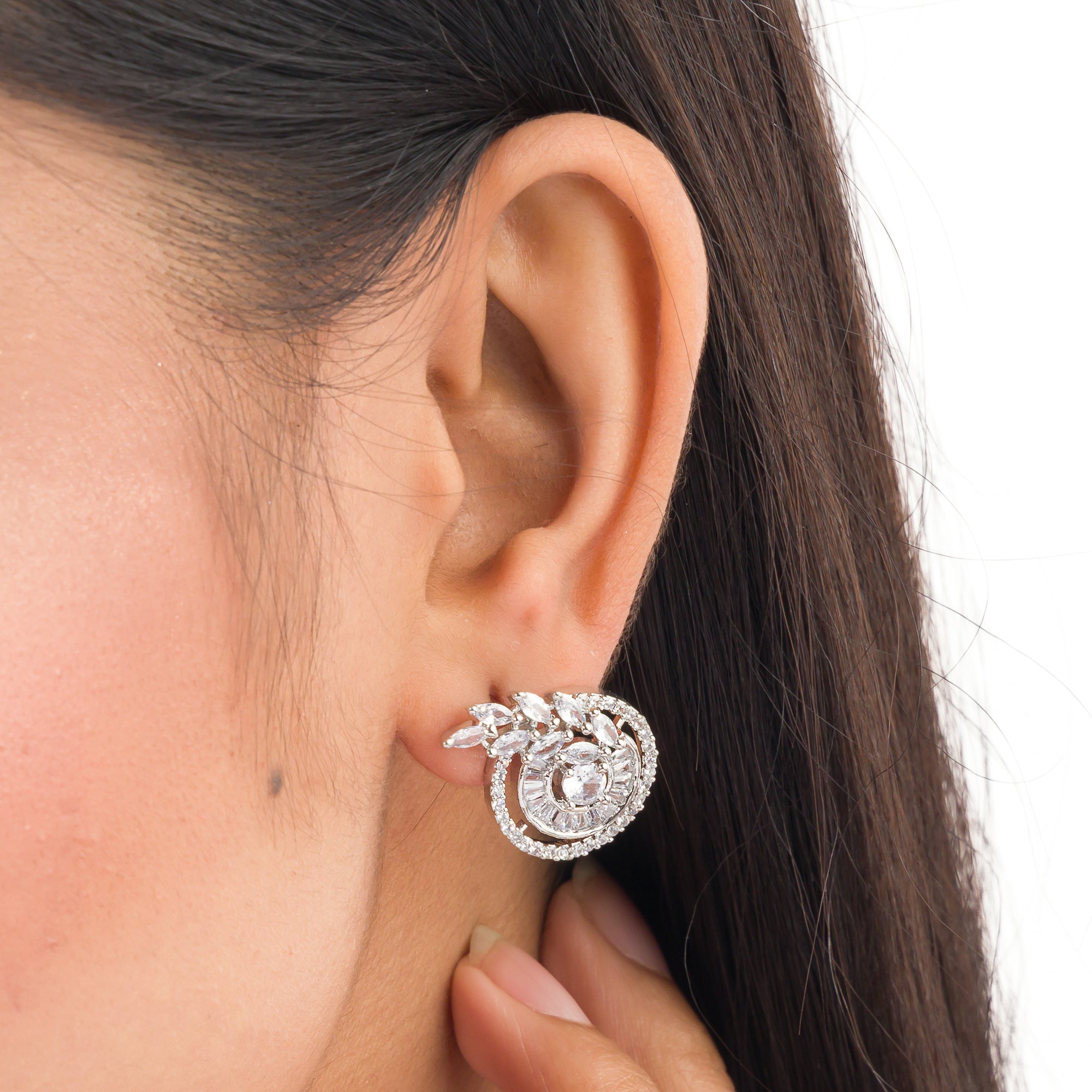 "Round and leaf zircon earrings combine sparkling beauty with nature-inspired, elegant charm."