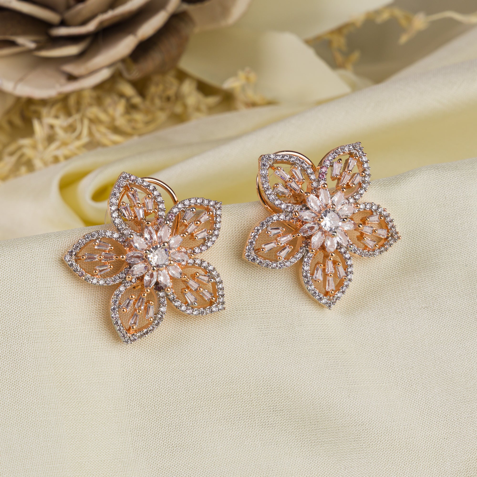 "Rose gold zircon earrings with sparkling brilliance for a sophisticated touch."