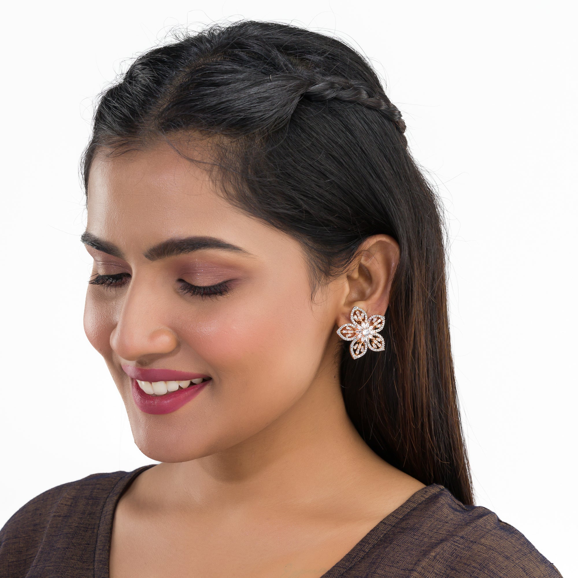 "Rose gold zircon earrings with sparkling brilliance for a sophisticated touch."