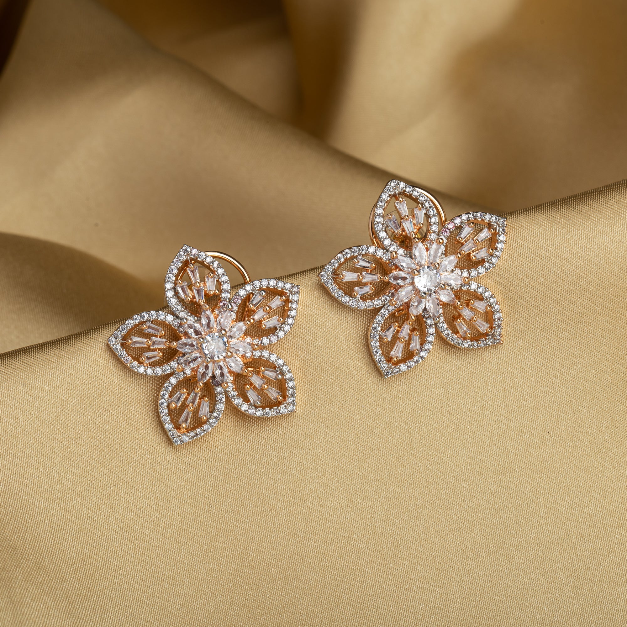 "Rose gold zircon earrings with sparkling brilliance for a sophisticated touch."