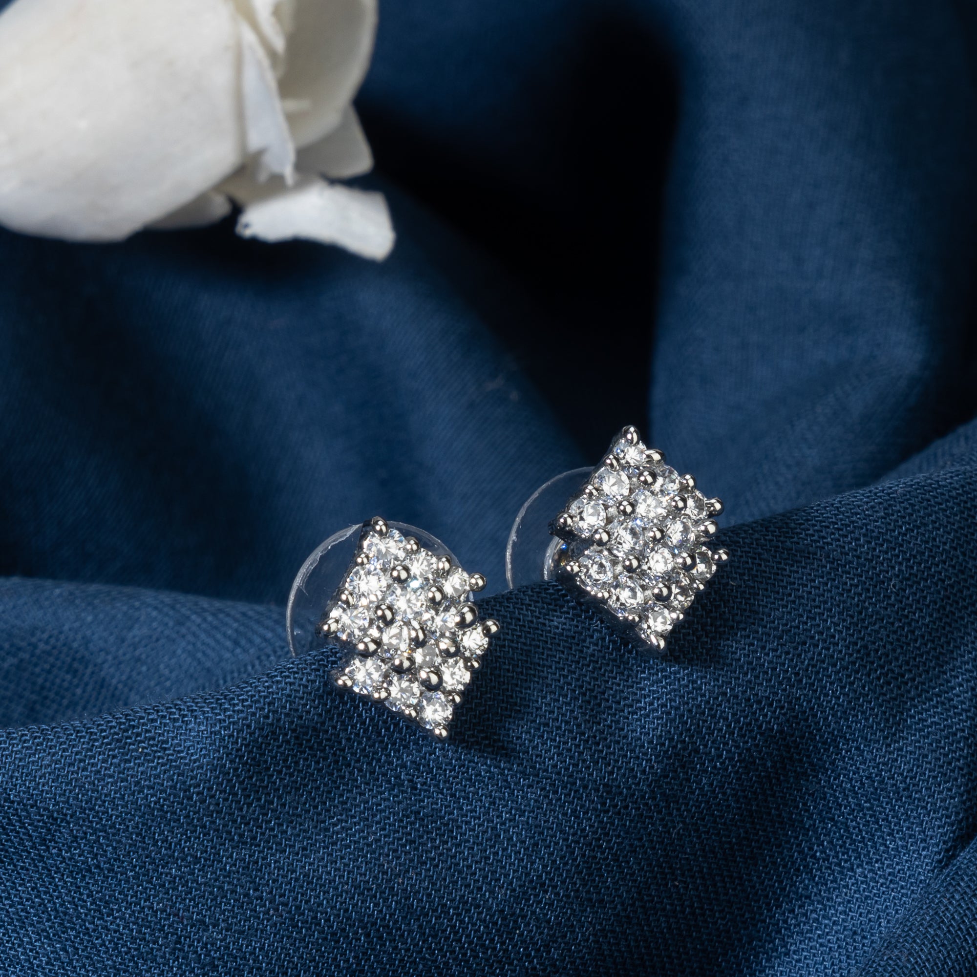 "Silver zircon earrings offer brilliant sparkle and timeless elegance for any occasion."