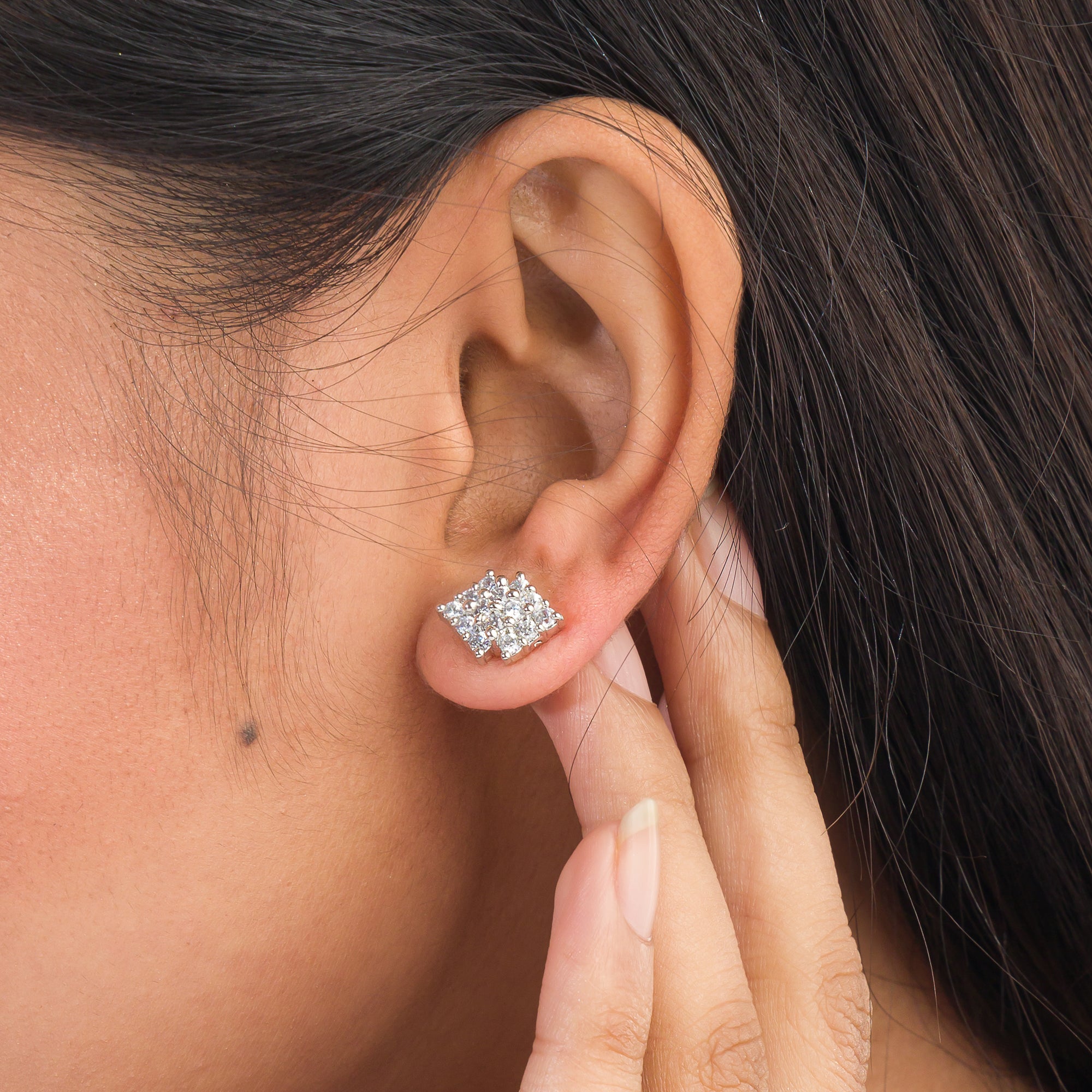 "Silver zircon earrings offer brilliant sparkle and timeless elegance for any occasion."
