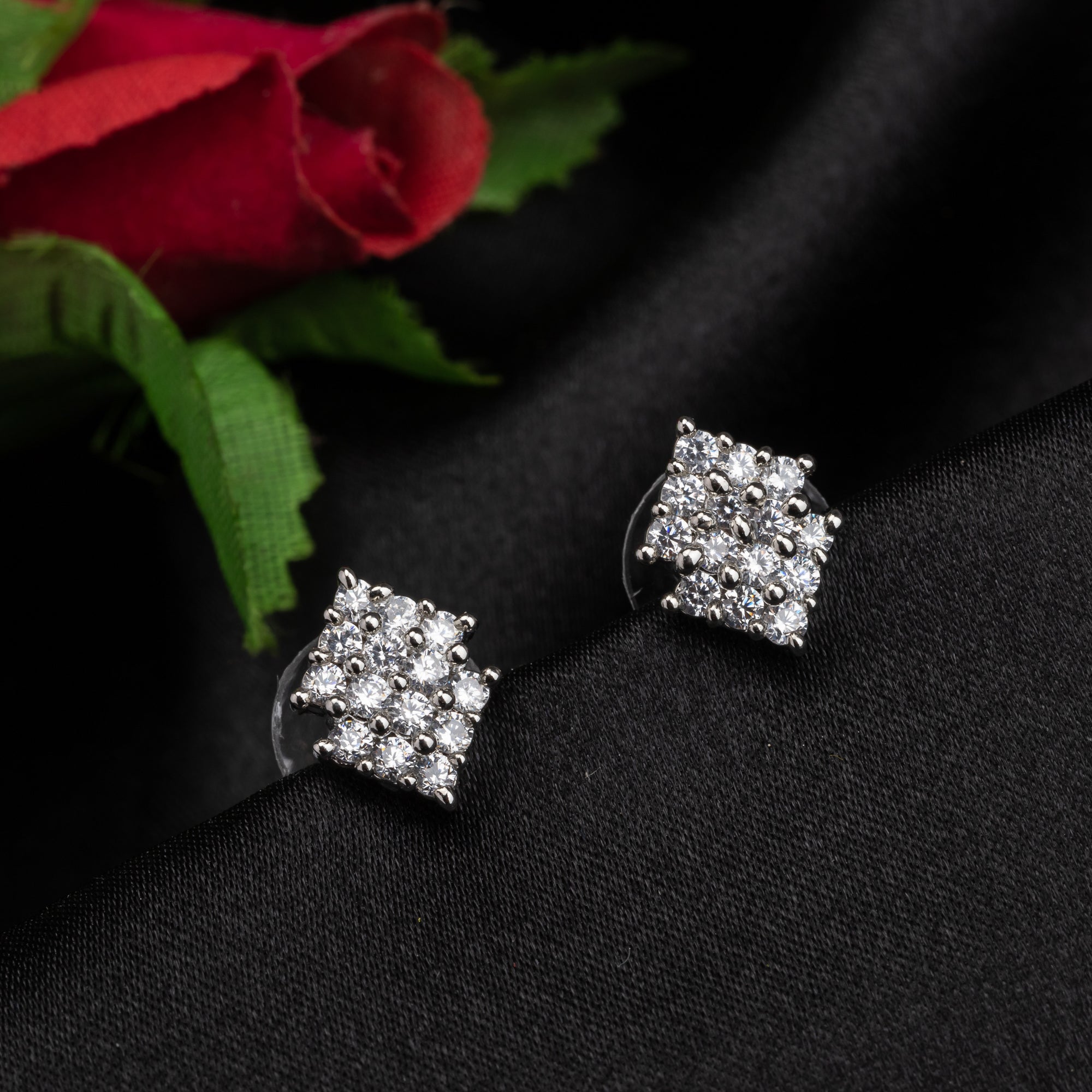 "Silver zircon earrings offer brilliant sparkle and timeless elegance for any occasion."