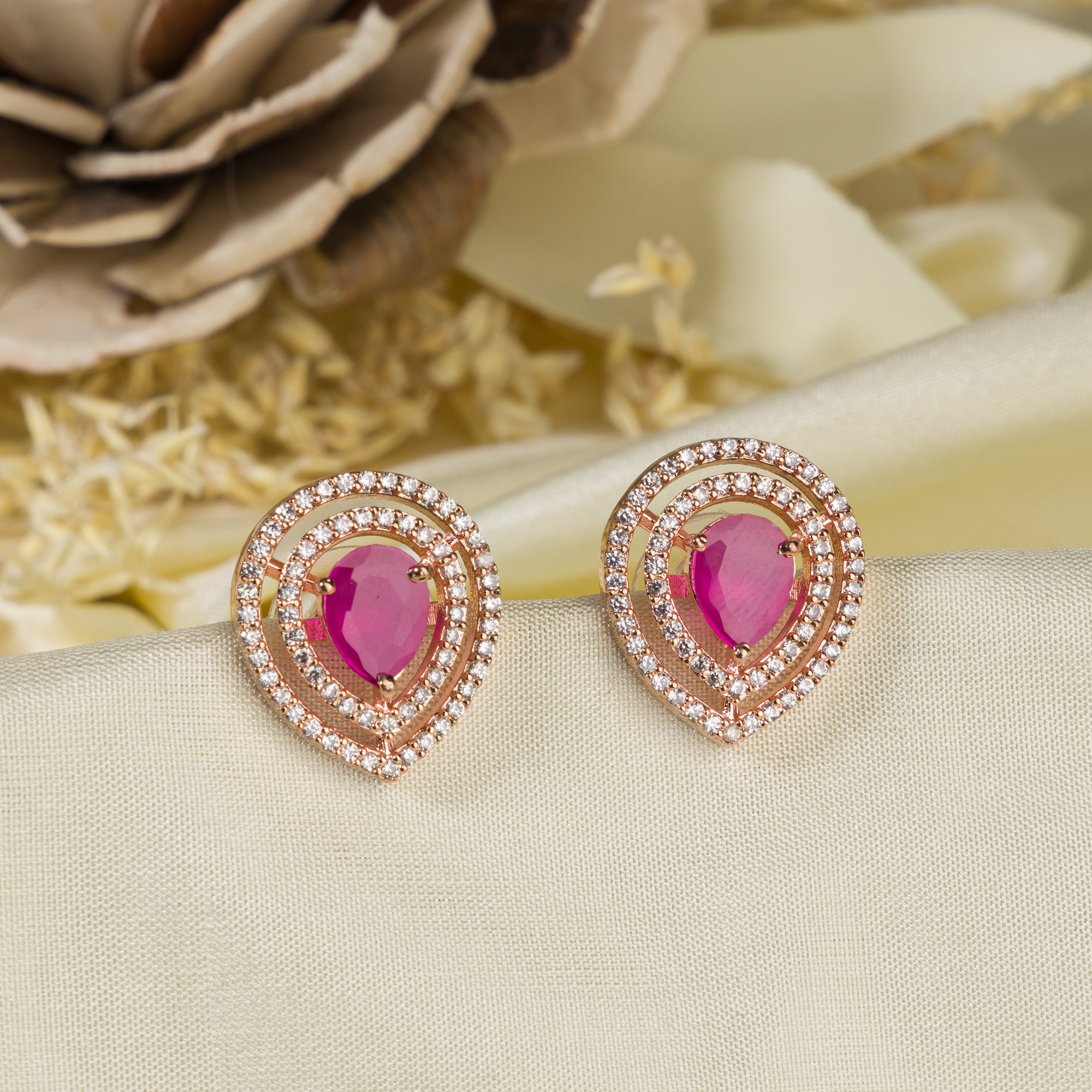 Pink zircon earrings offering vibrant elegance with a sparkling, romantic touch.