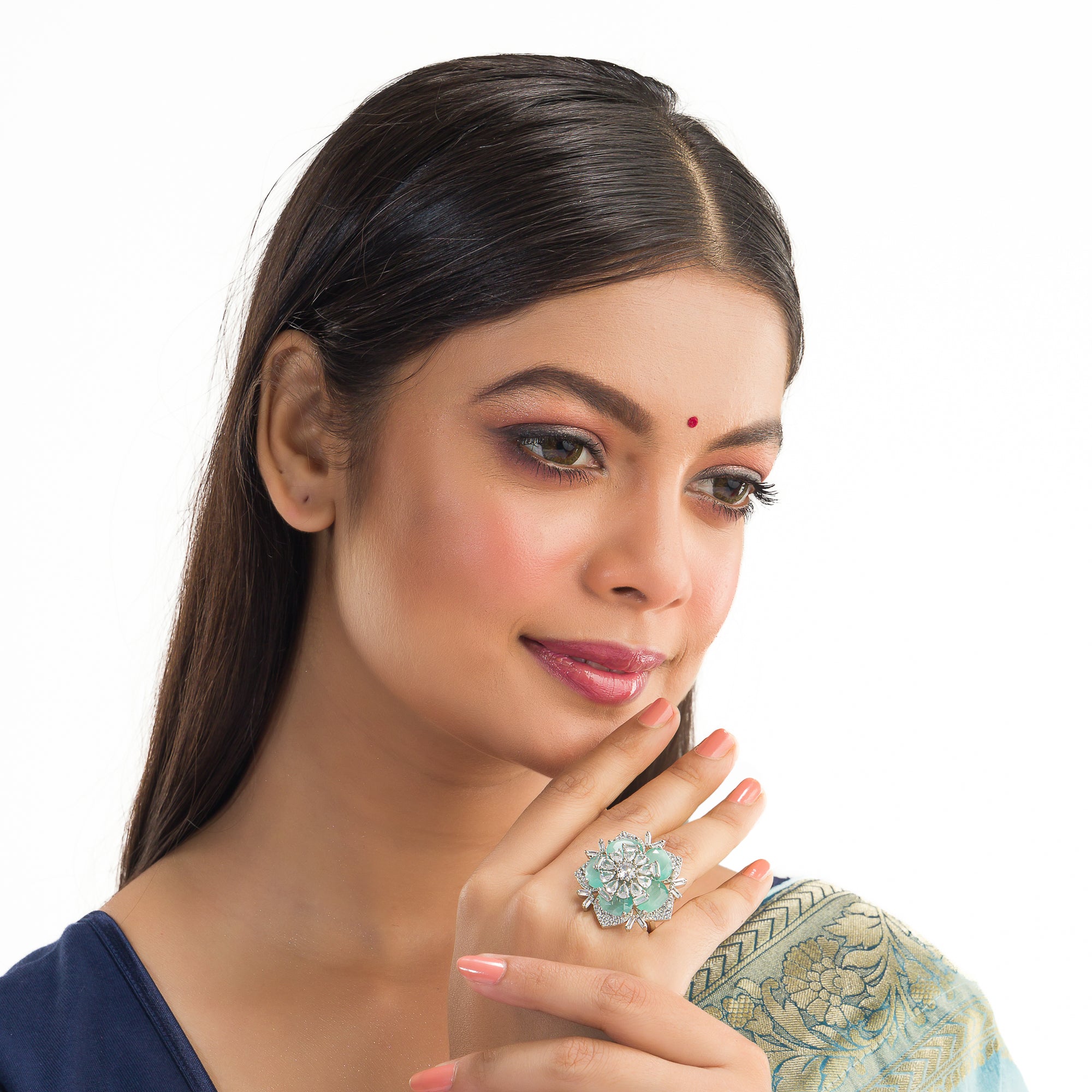 Silver zircon finger ring with turquoise stone offers vibrant charm and sparkling brilliance.