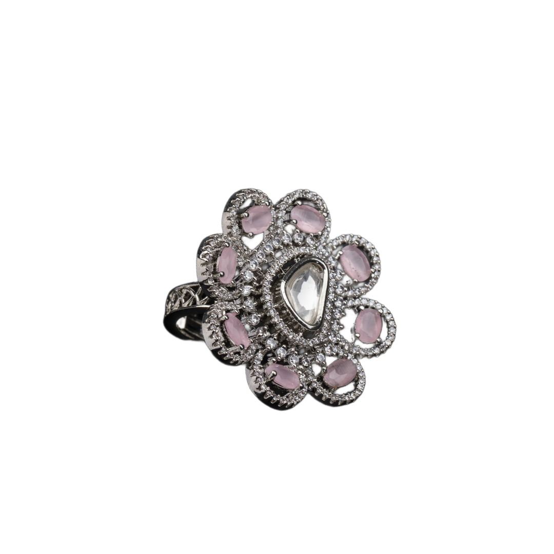 Floral zircon finger ring with orchid stones offers a graceful and elegant party look.