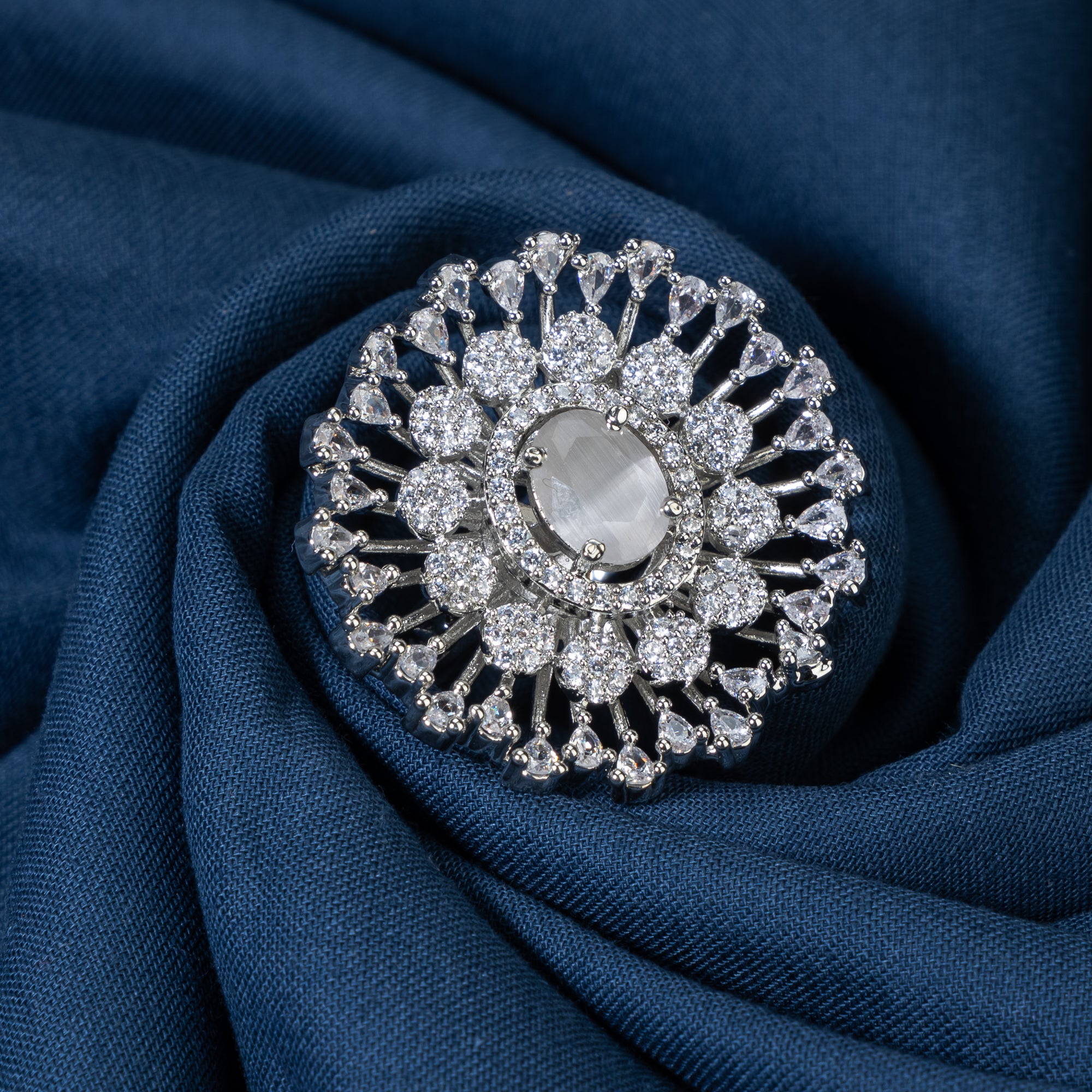 Zircon finger ring with a green stone offers a refreshing and vibrant touch for casual wear.