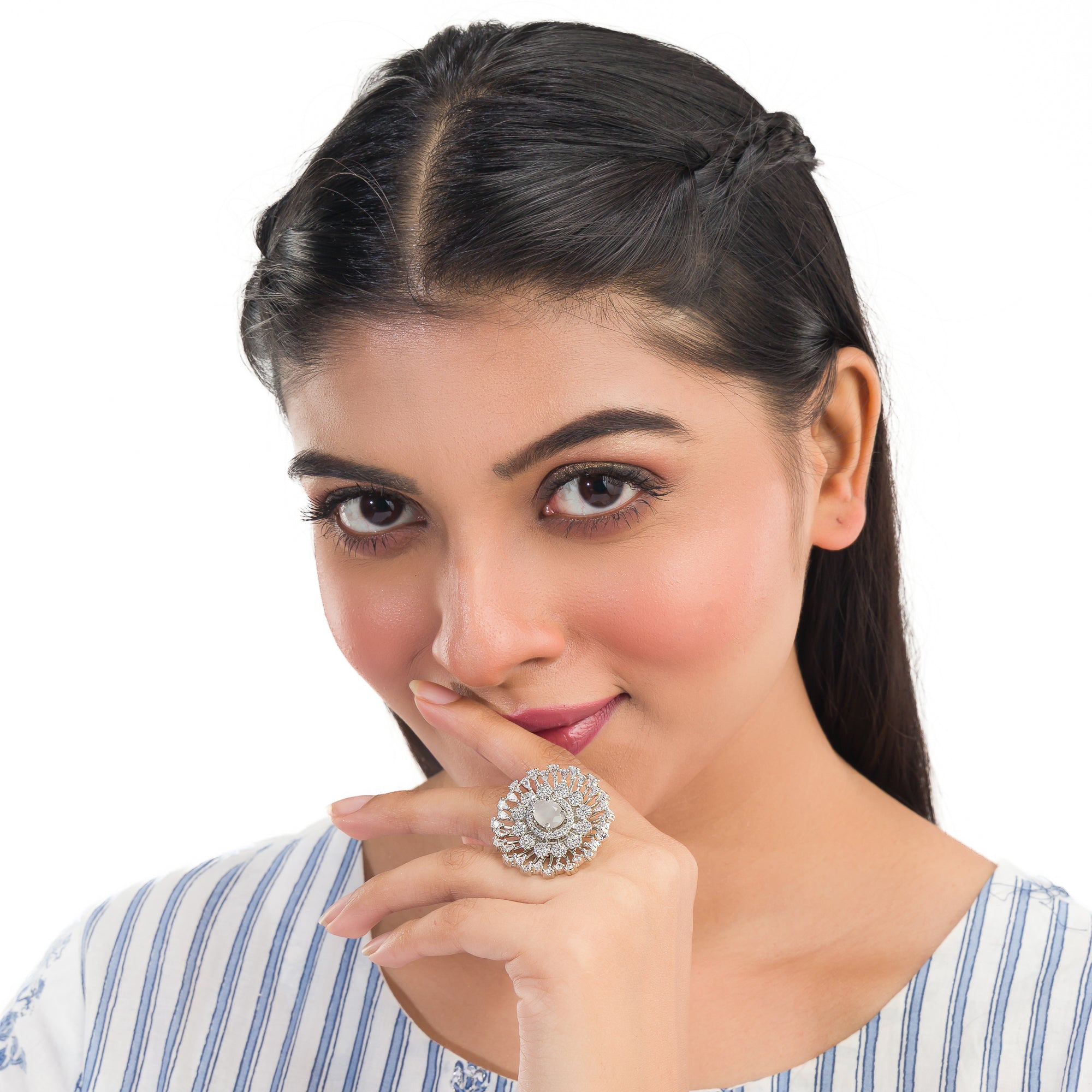 Zircon finger ring with a green stone offers a refreshing and vibrant touch for casual wear.