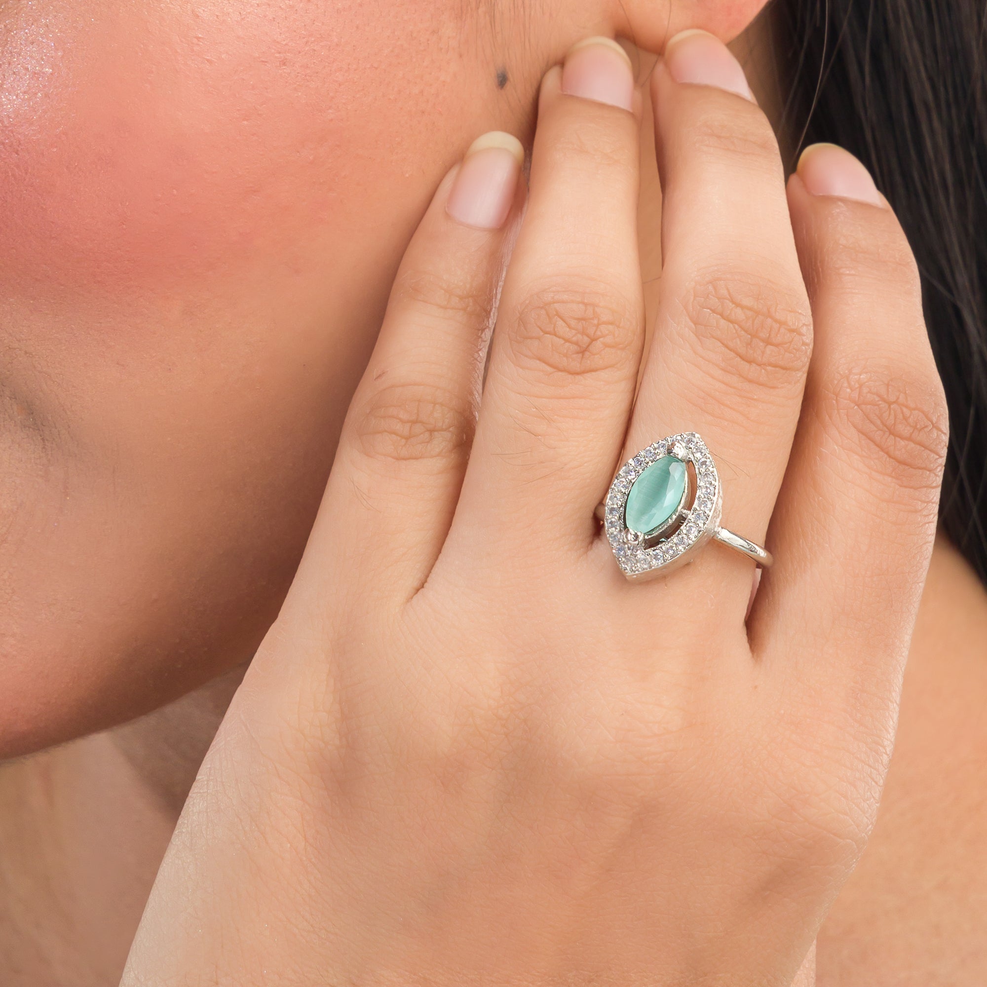 Zircon finger ring with turquoise stone adds a serene and chic sparkle for any occasion.
