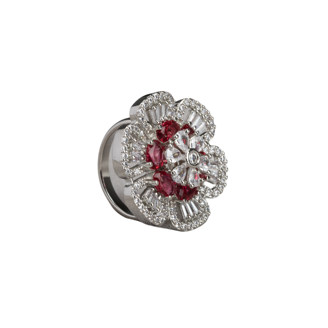Red zircon finger ring in silver offers a bold and vibrant touch for party occasions.