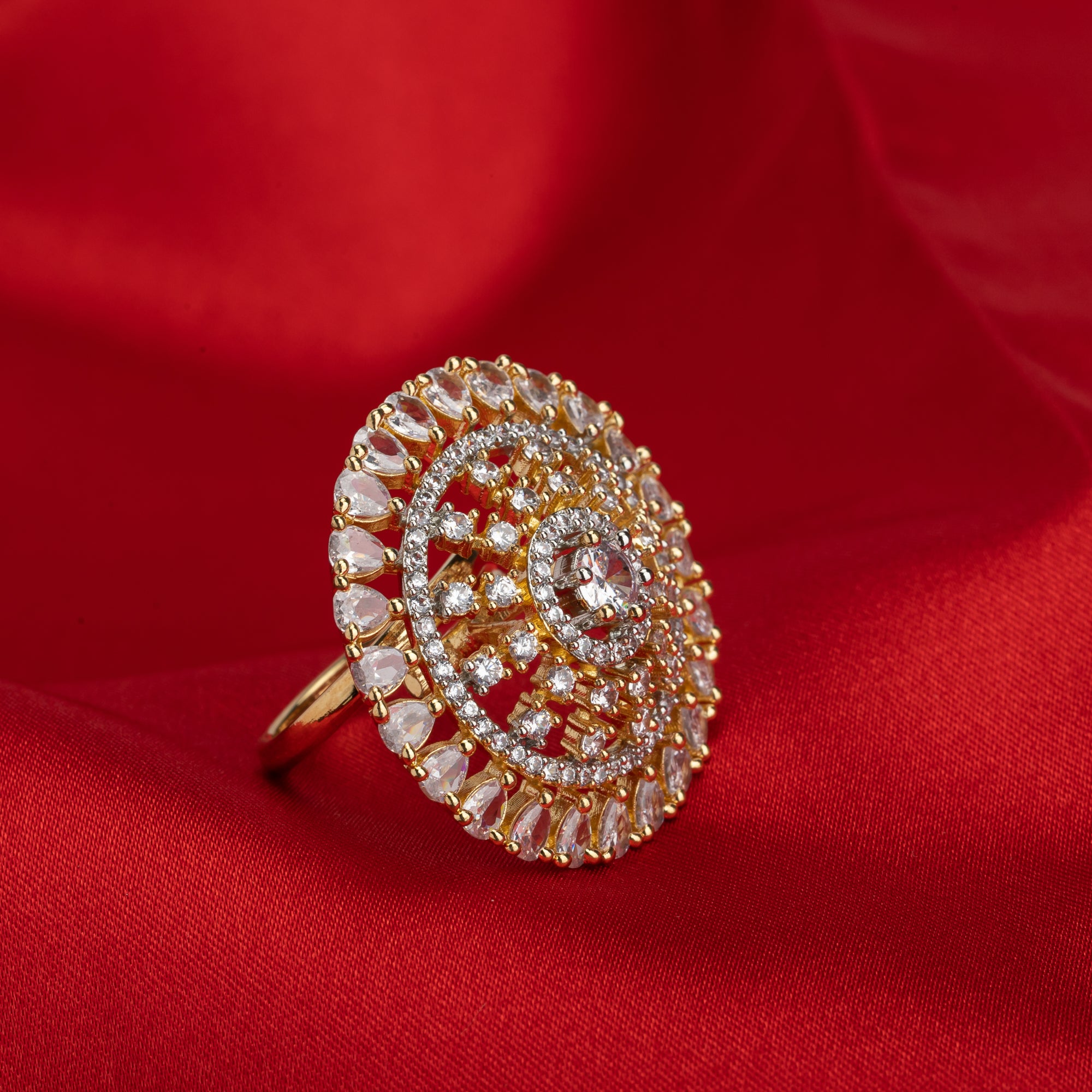 Golden zircon finger ring combines luxurious sparkle with a timeless gold-tone finish.