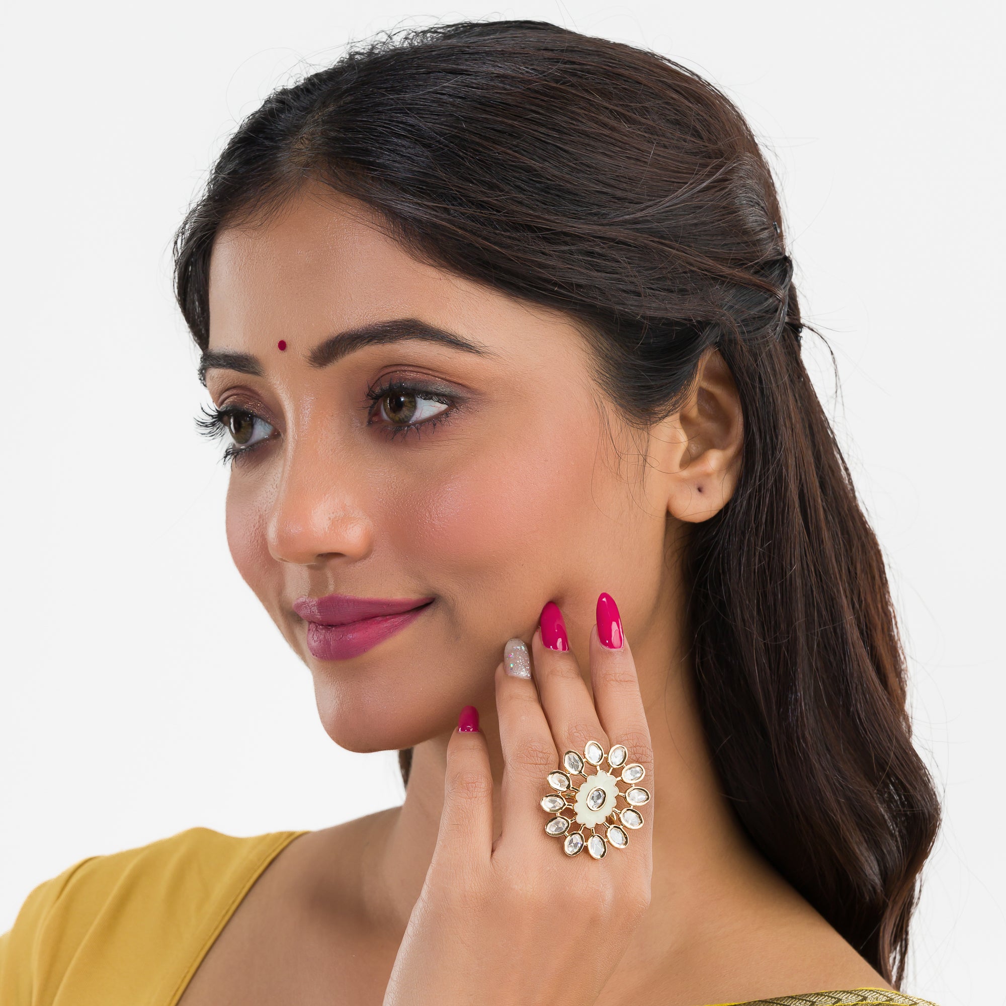 Golden zircon finger ring adds a touch of timeless elegance with its sparkling brilliance.