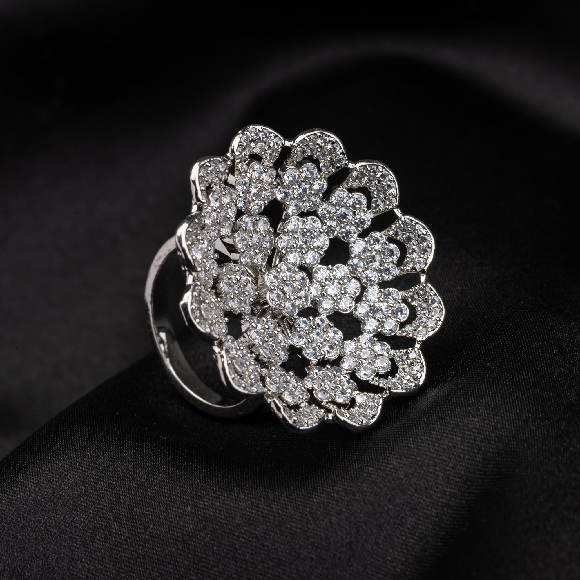 Silver zircon floral ring offers a blend of timeless charm and sparkling beauty, perfect for parties.