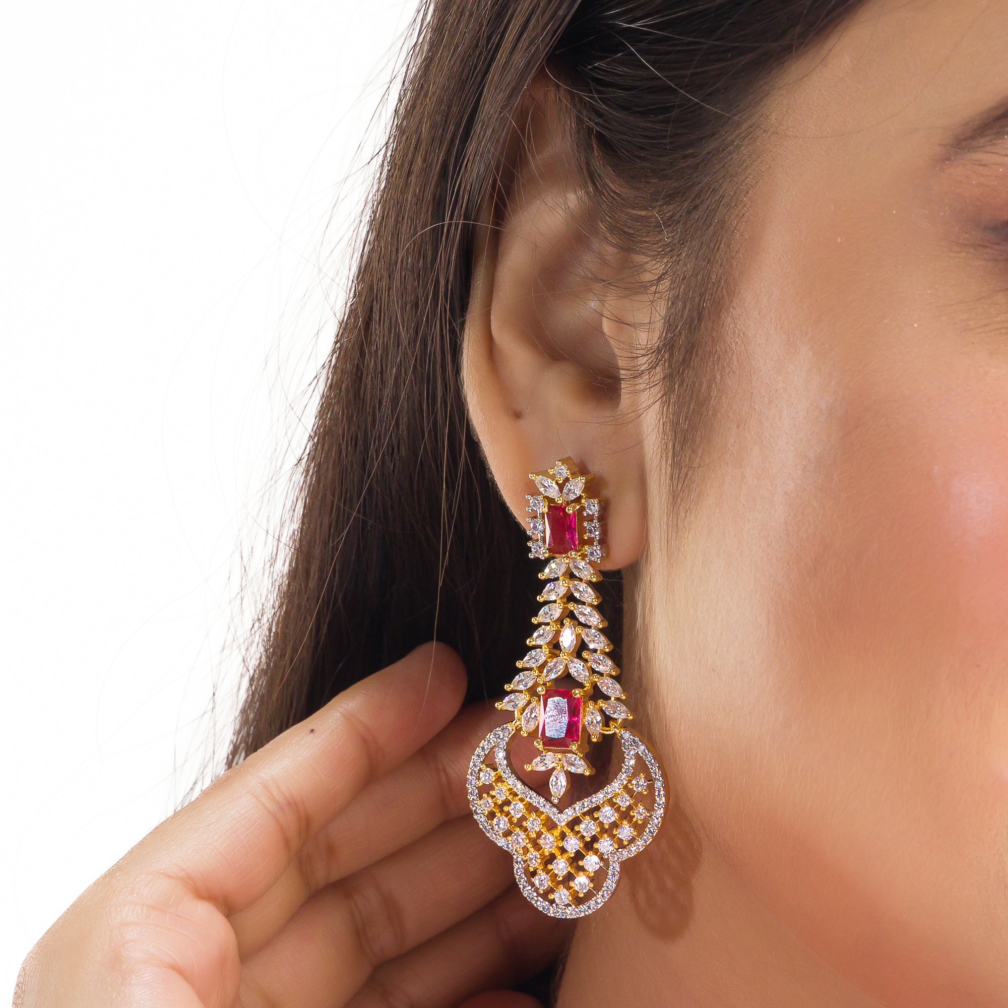 Red zircon bridal necklace set features intricate designs, perfect for a regal wedding look.