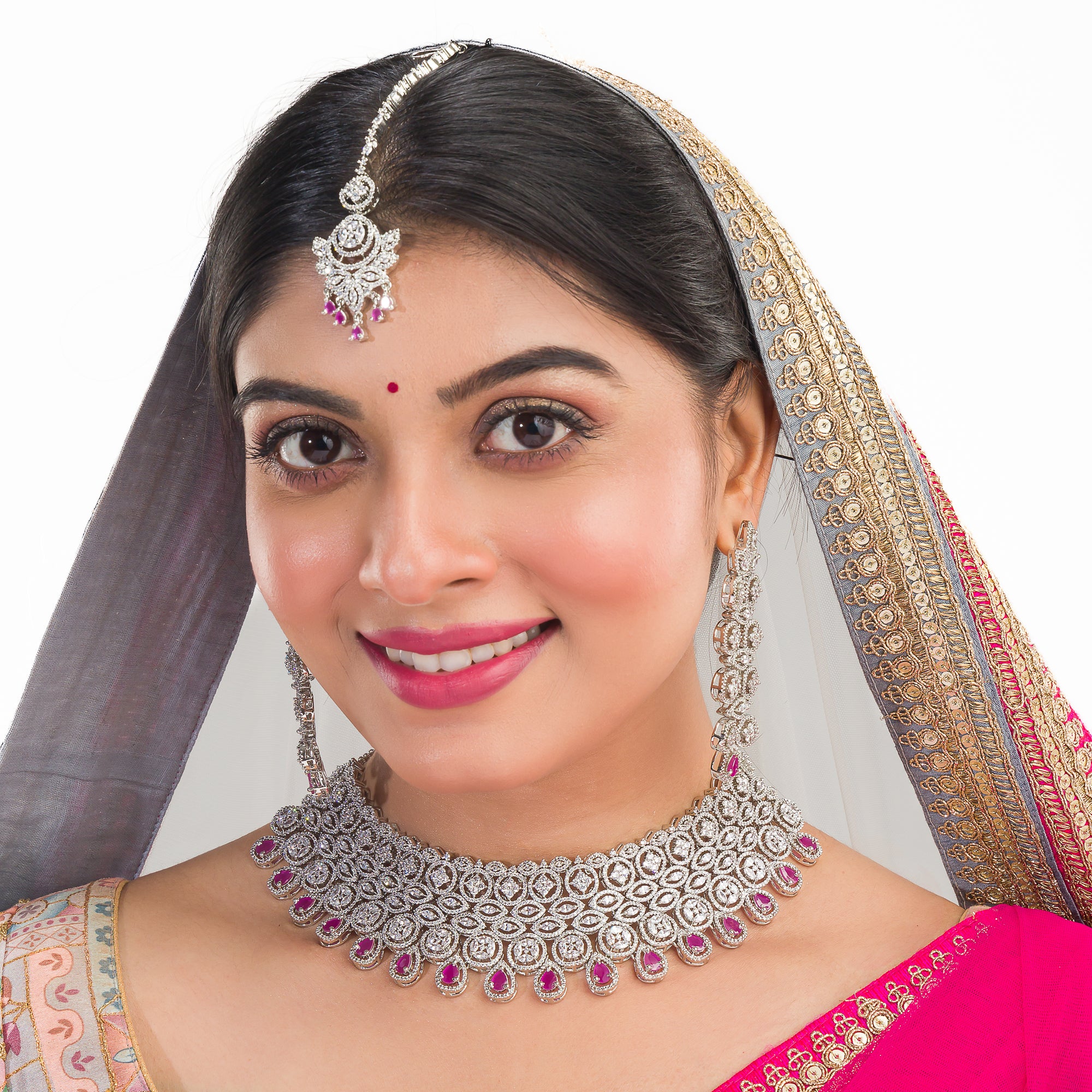 Pink zircon bridal necklace set with intricate stone design.