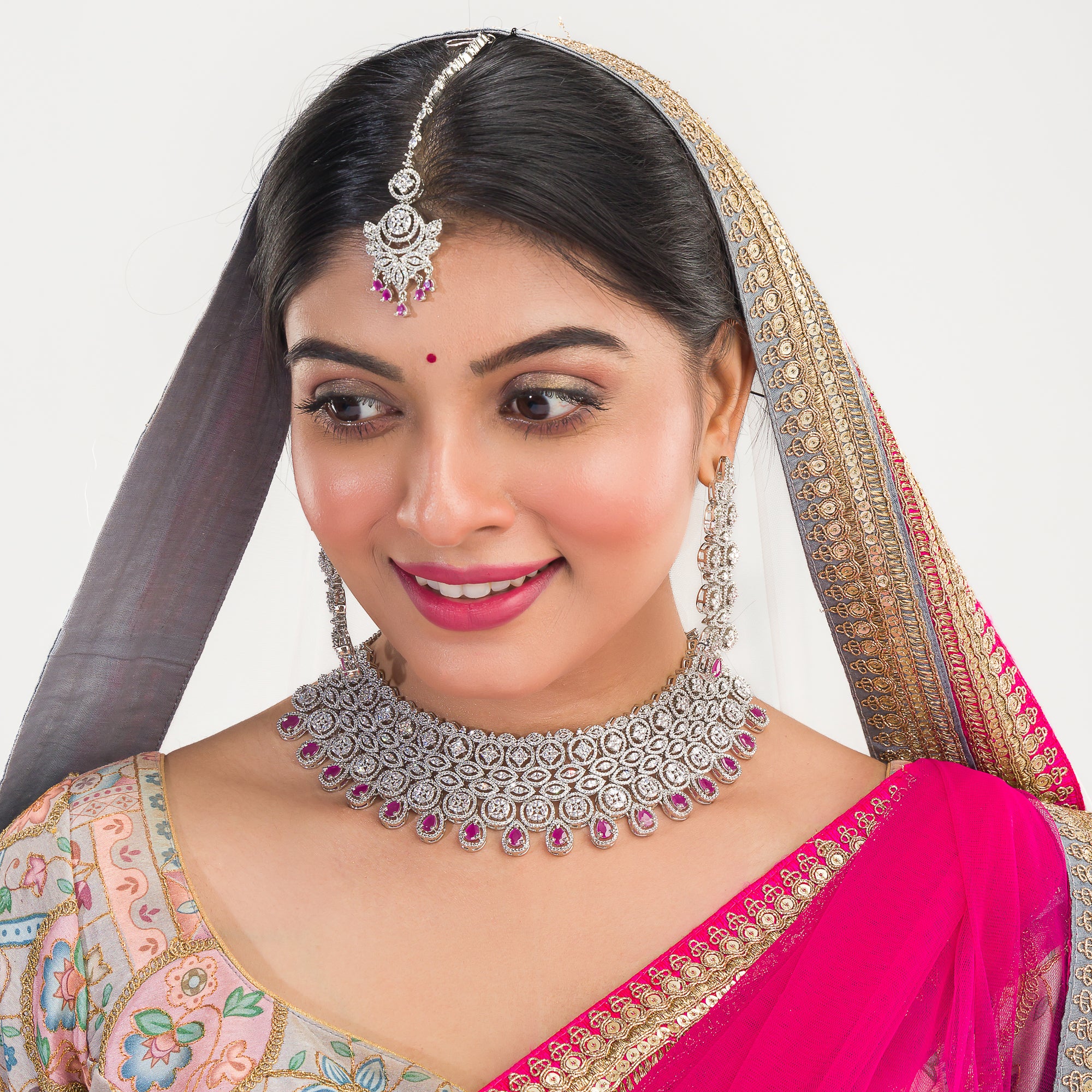 Pink zircon bridal necklace set with intricate stone design.