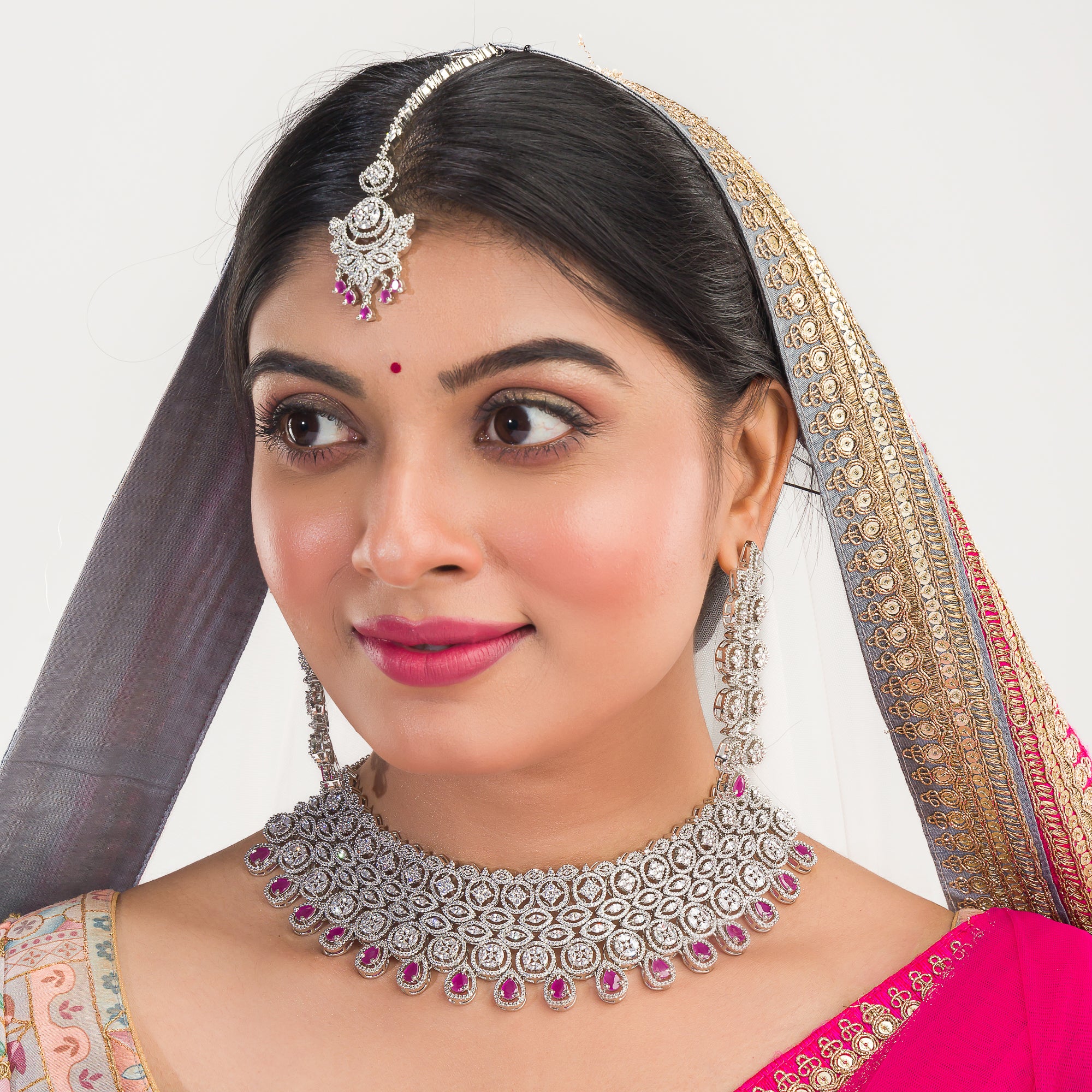 Pink zircon bridal necklace set with intricate stone design.