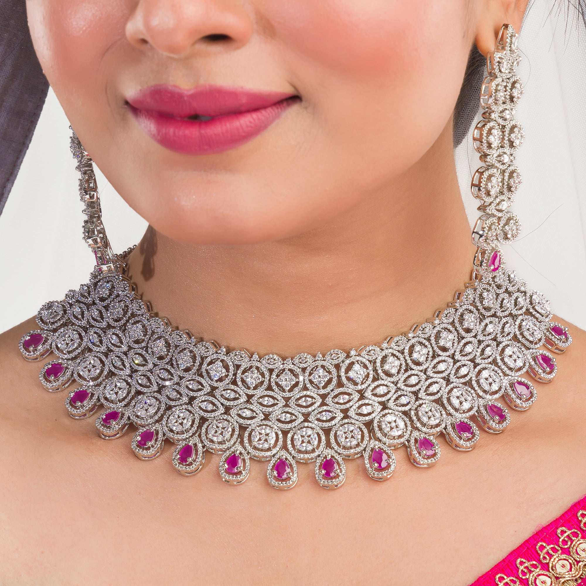 Pink zircon bridal necklace set with intricate stone design.