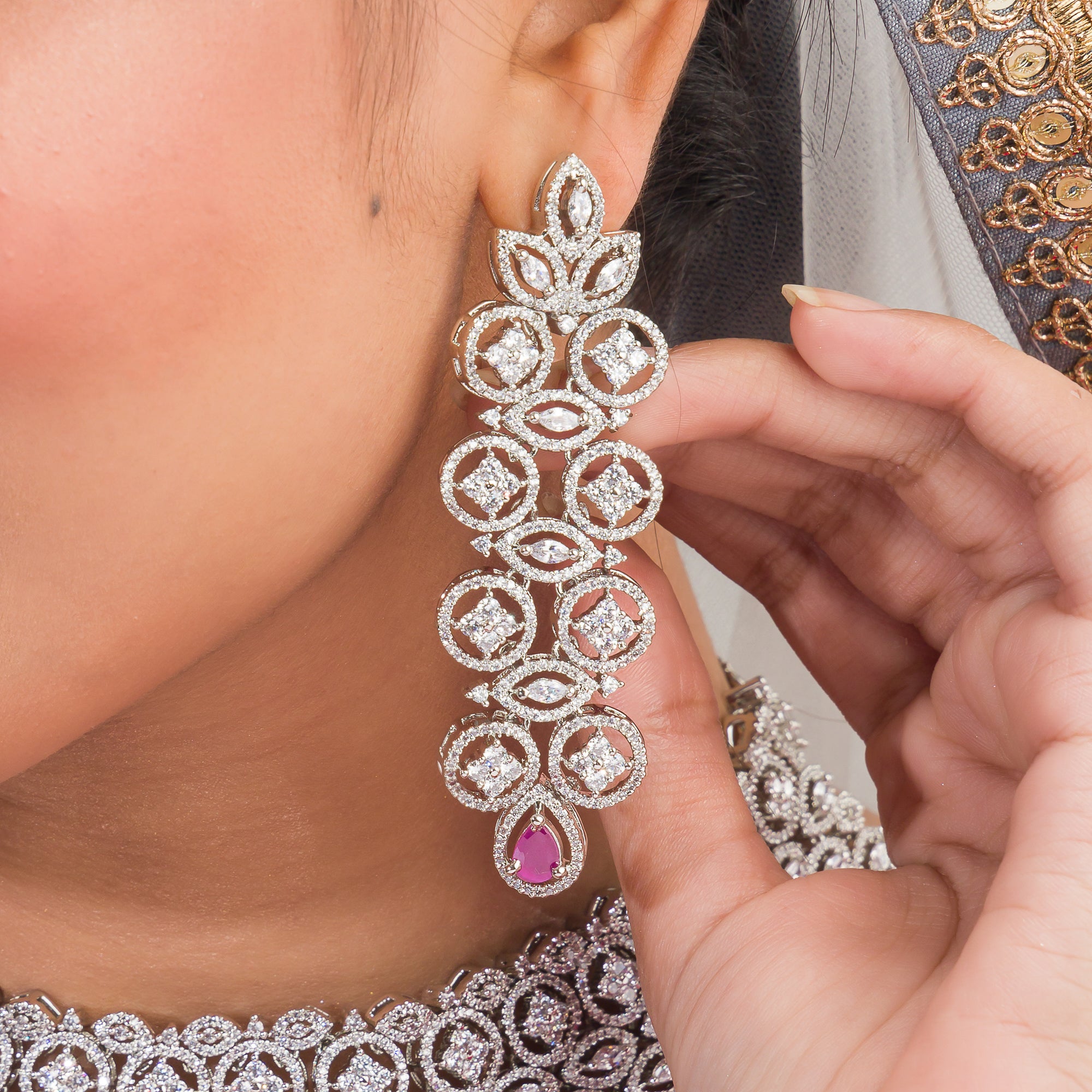 Pink zircon bridal necklace set with intricate stone design.