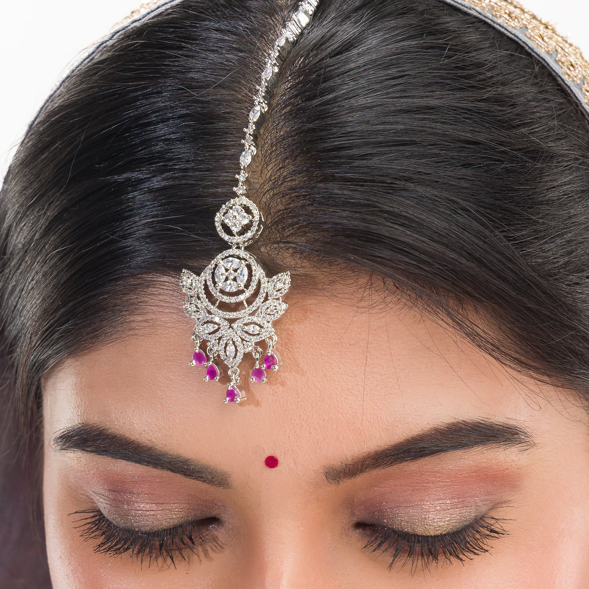 Pink zircon bridal necklace set with intricate stone design.