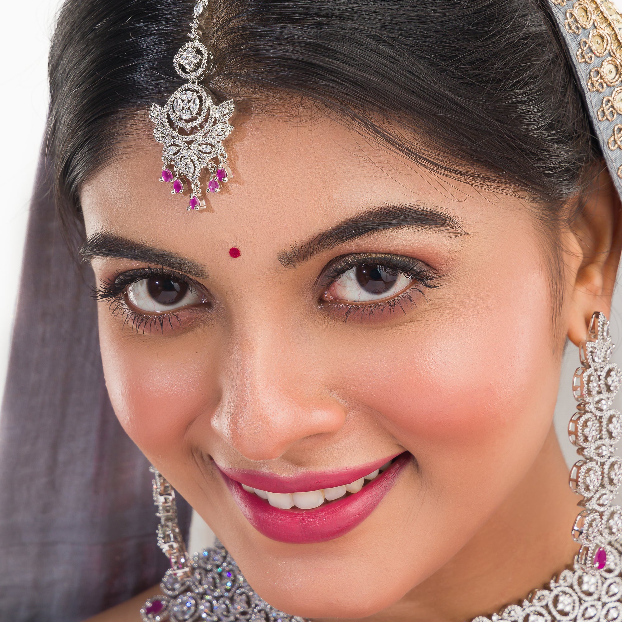 Pink zircon bridal necklace set with intricate stone design.