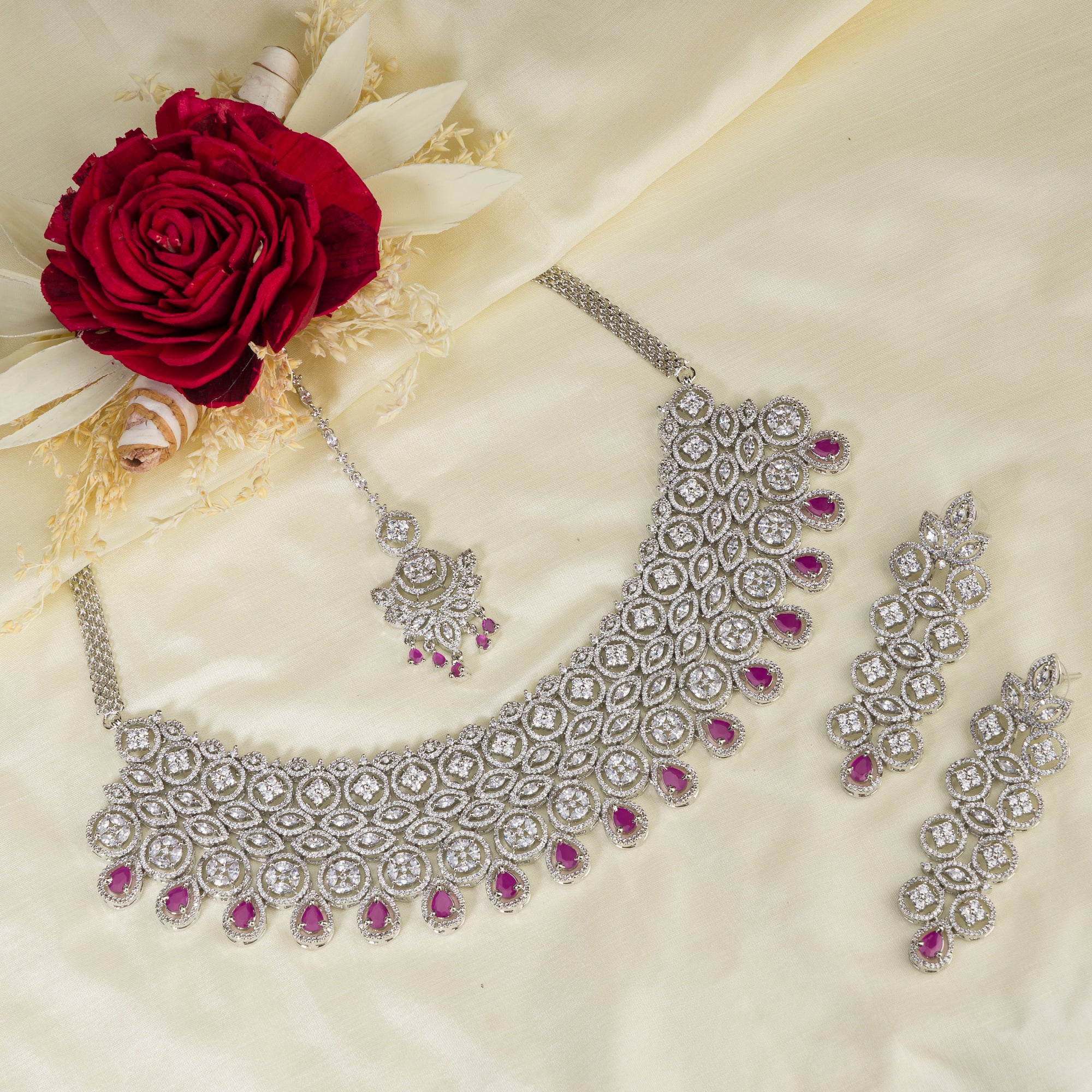 Pink zircon bridal necklace set with intricate stone design.