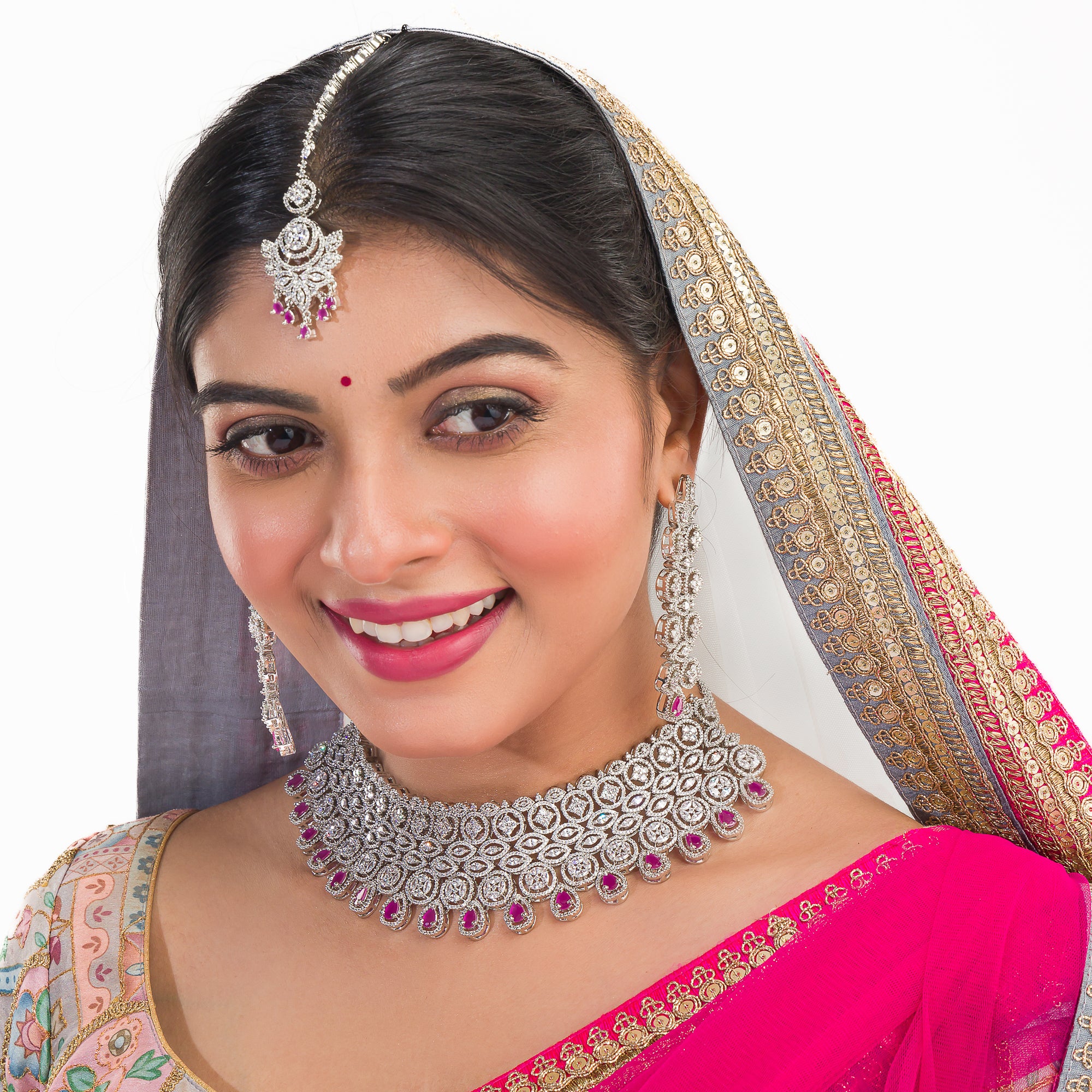 Pink zircon bridal necklace set with intricate stone design.