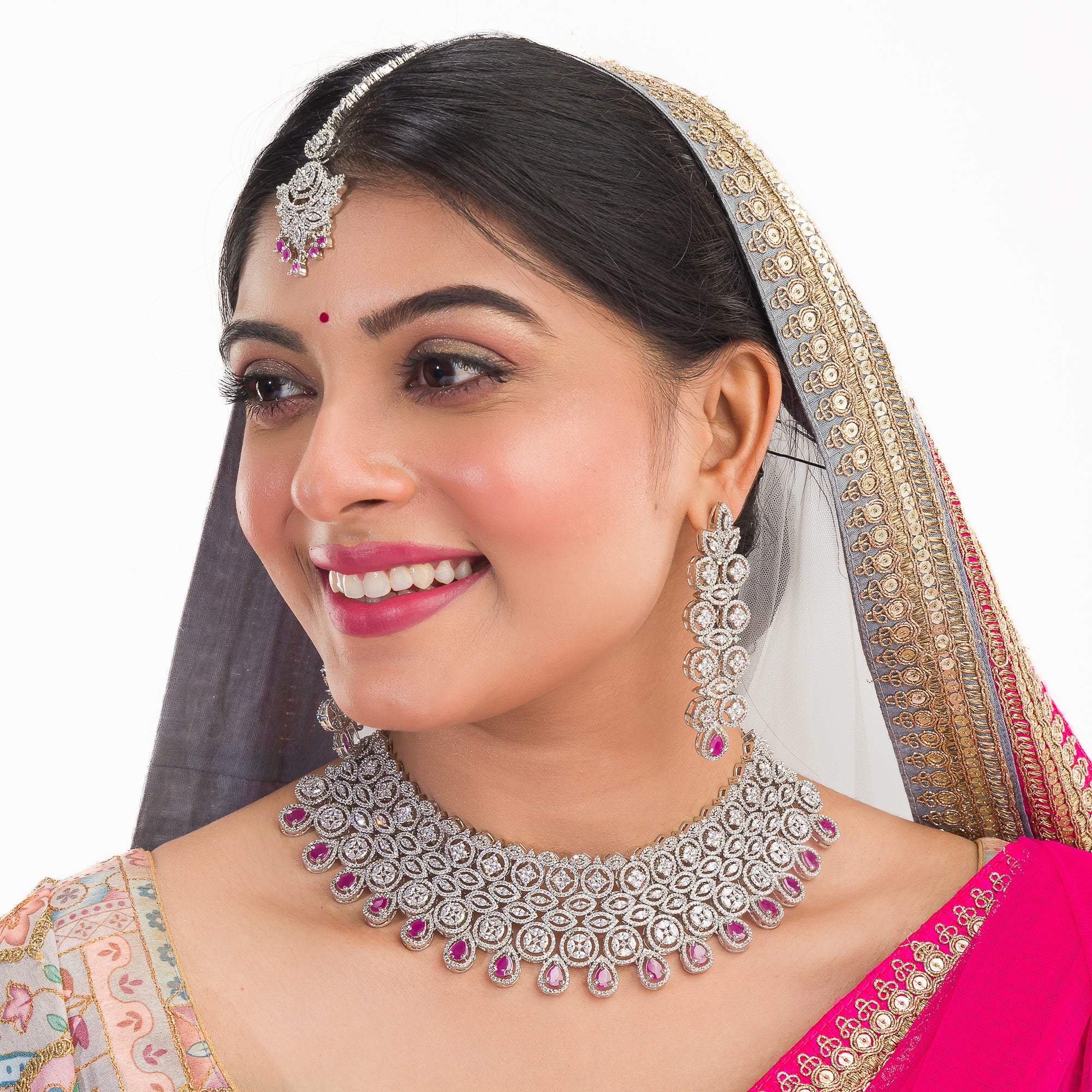 Pink zircon bridal necklace set with intricate stone design.
