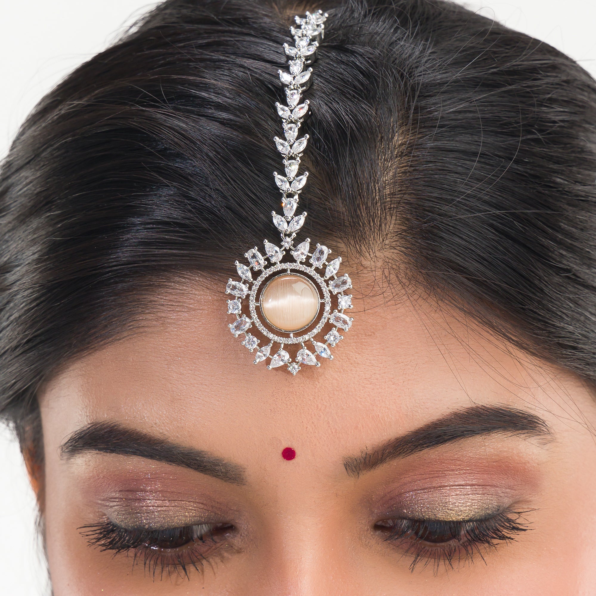 Salmon zircon bridal choker set with earrings and maangtika.