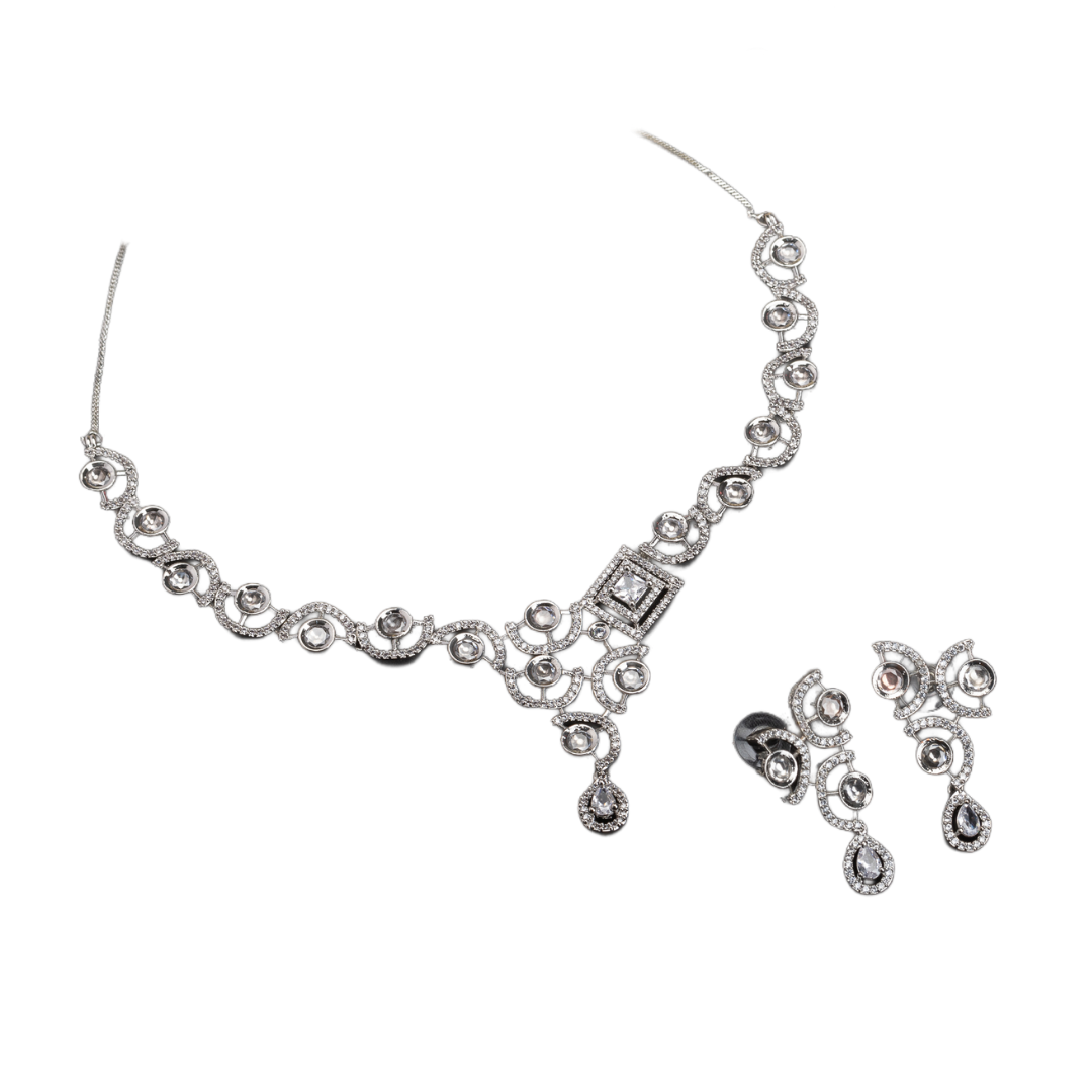 Sleek and elegant white zircon-studded necklace set for a refined party look.