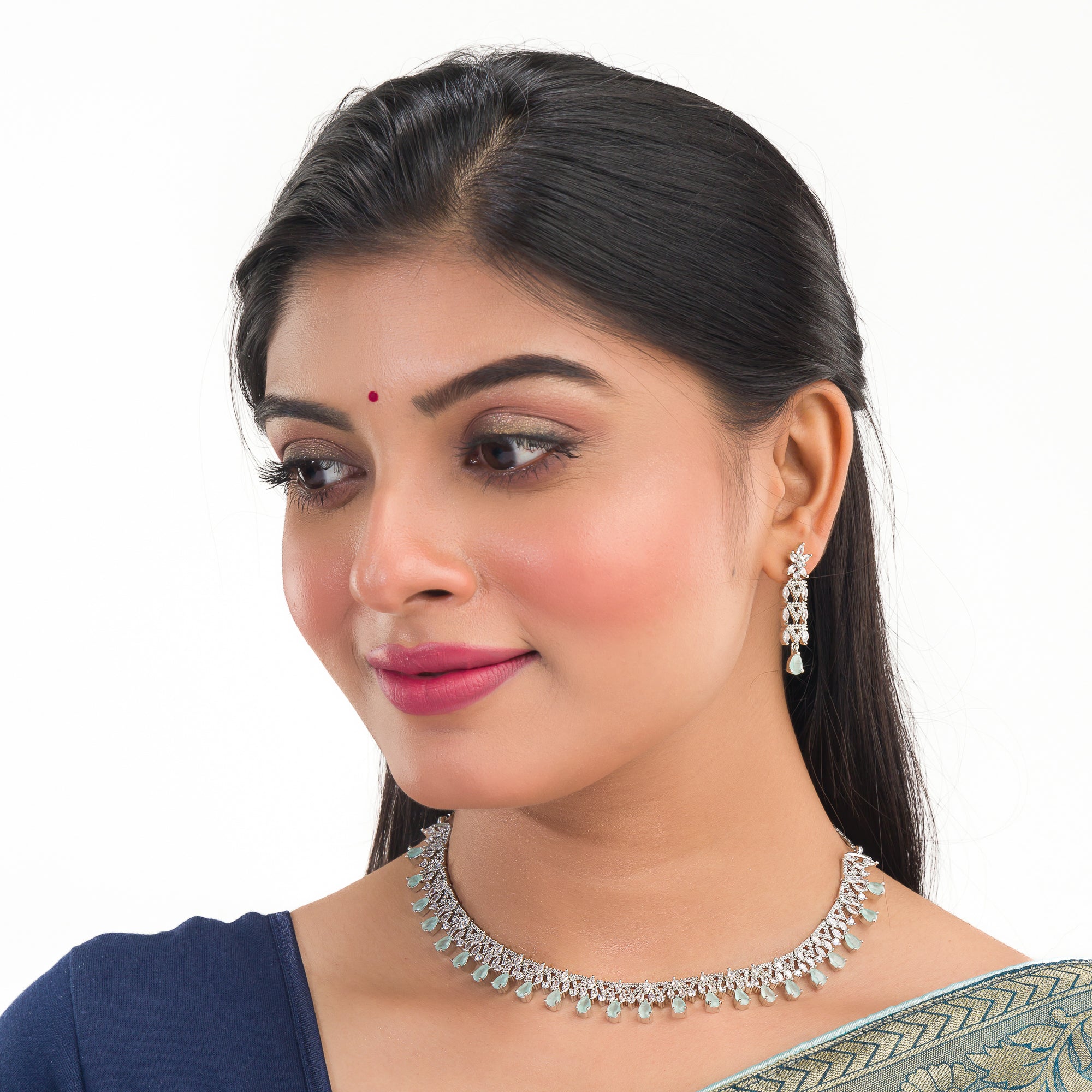 Aqua zircon-studded necklace set for elegance and charm, perfect for special occasions.