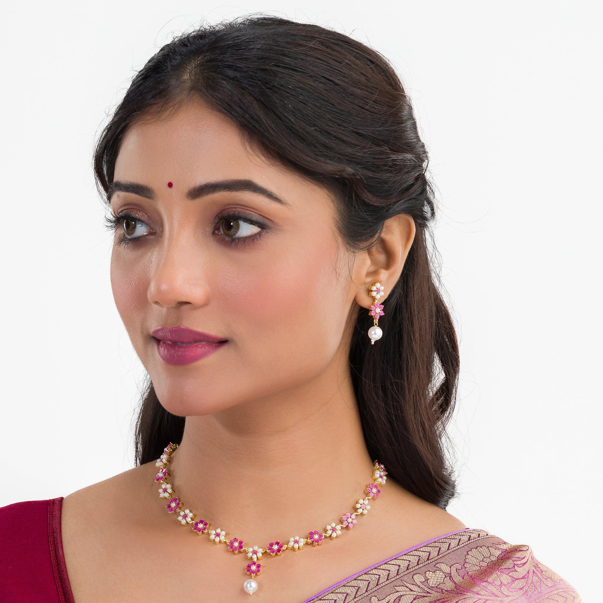 Pink pearl floral necklace set with matching earrings for timeless elegance and beauty.