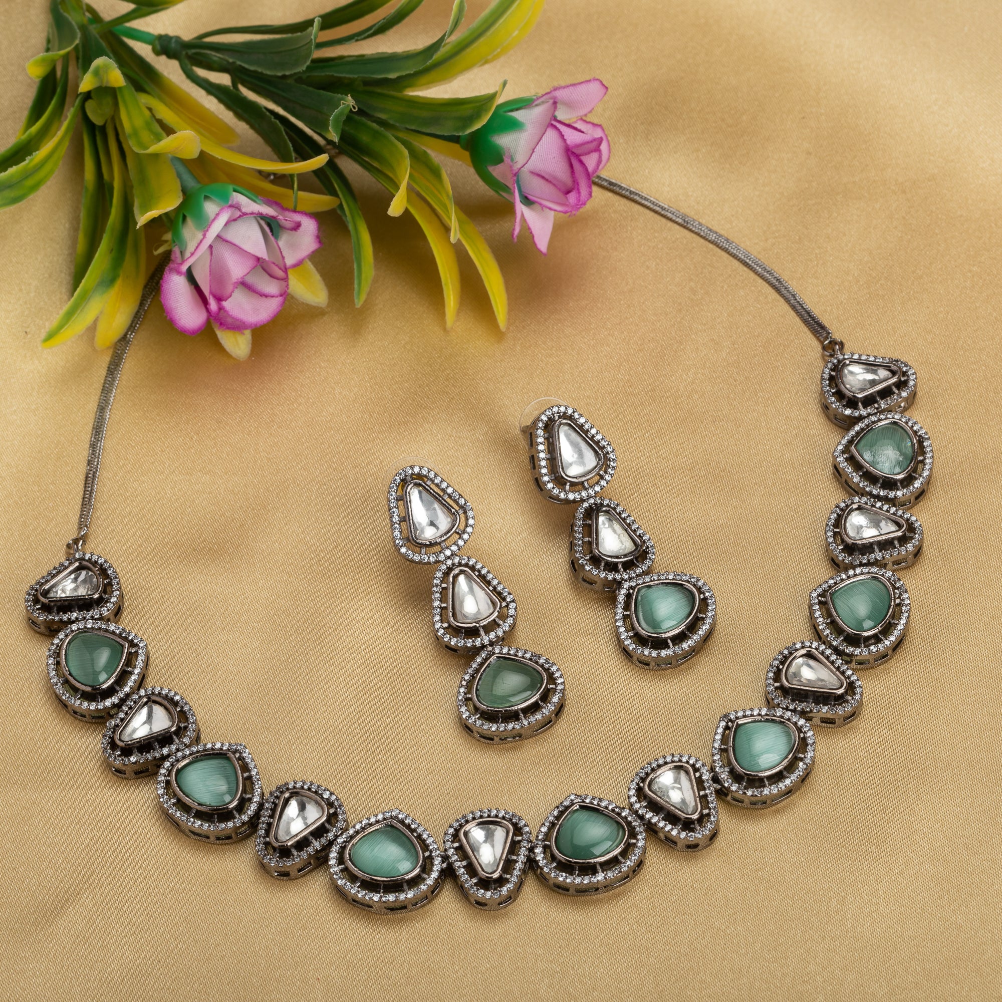 Turquoise and white zircon necklace set with sleek black polish for a bold and stylish design.
