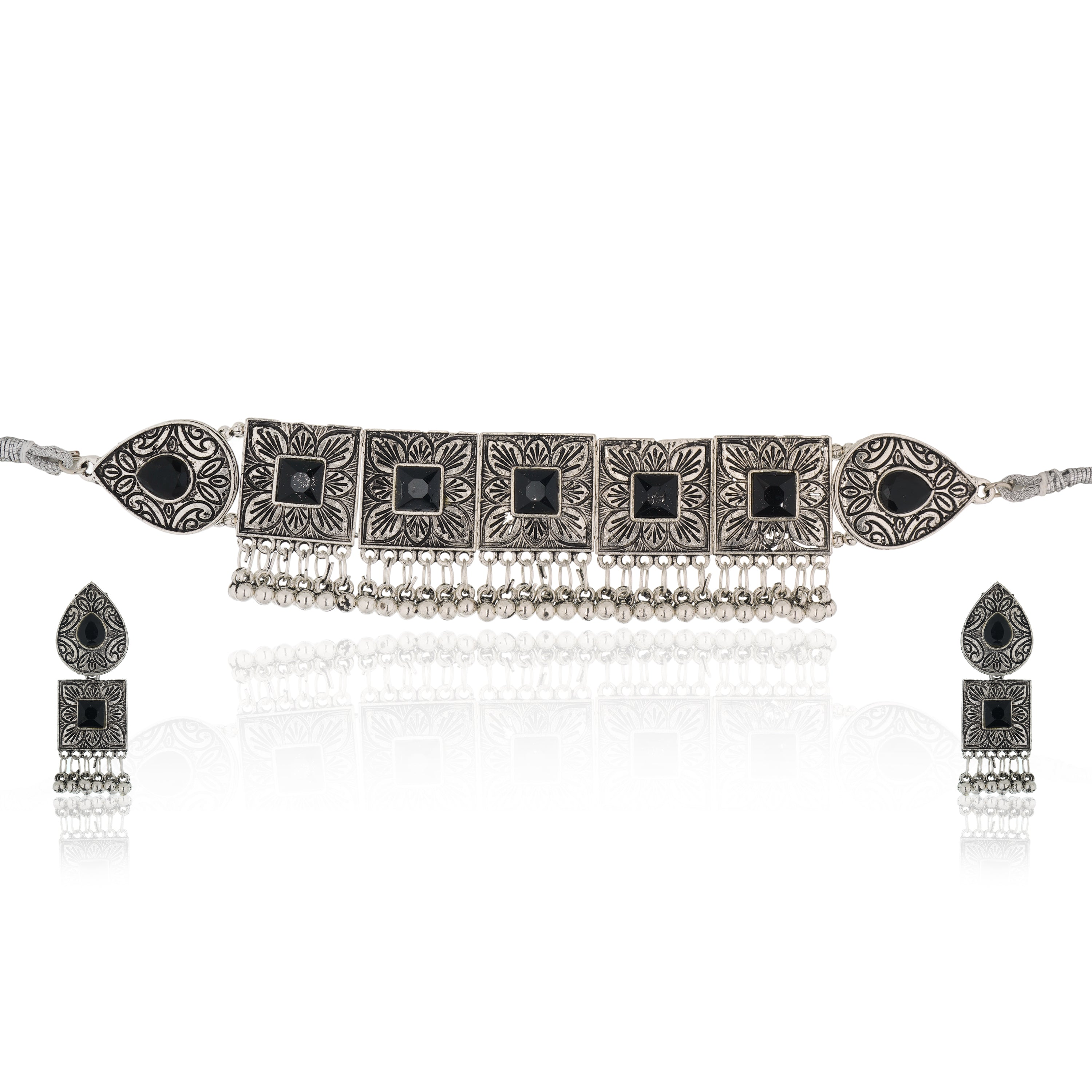 Oxidised choker set with black stones and matching earrings for a stunning festive appearance.