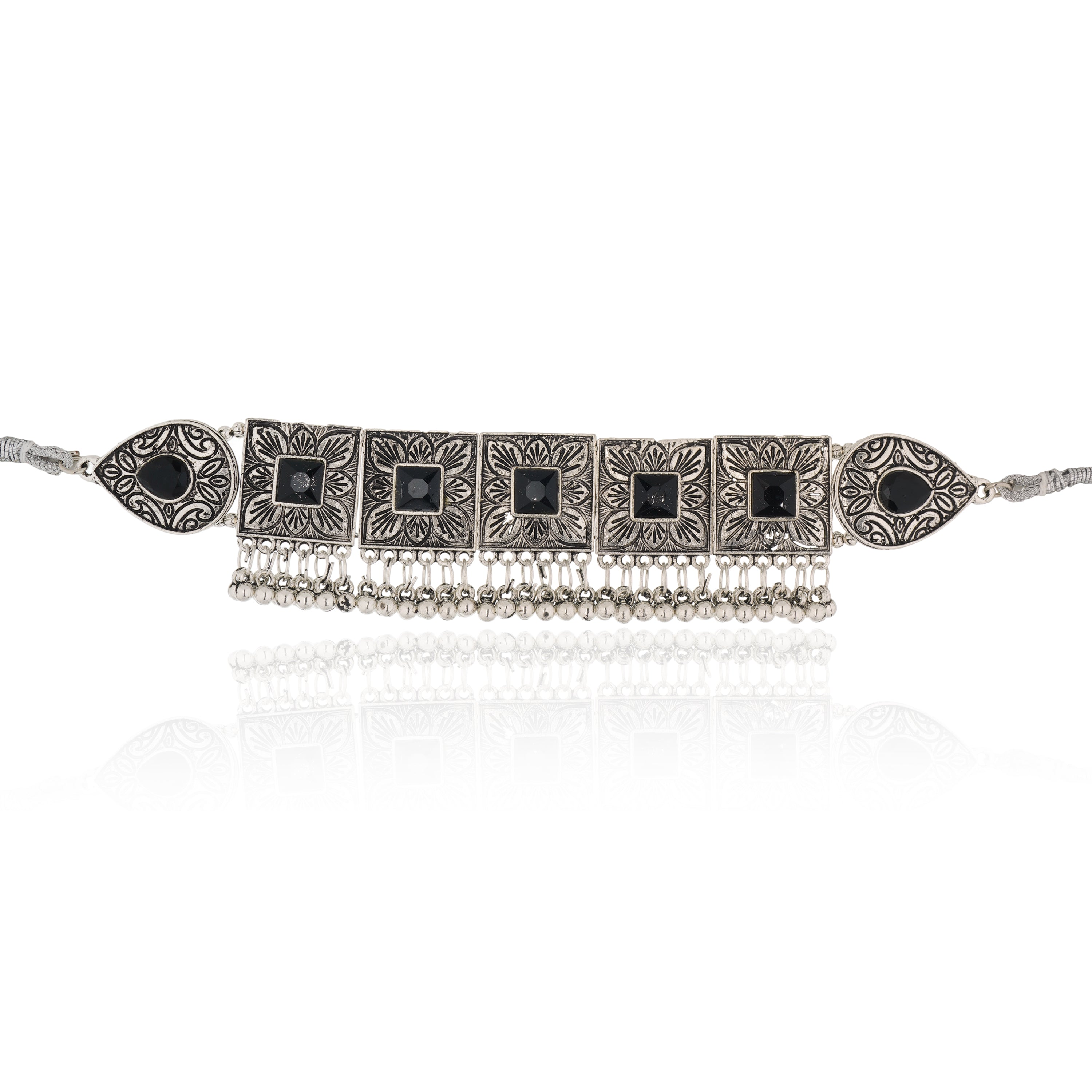 Oxidised choker set with black stones and matching earrings for a stunning festive appearance.