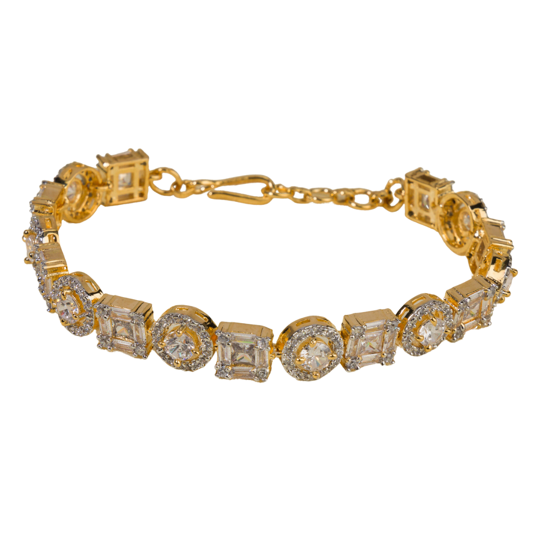 Golden zircon-studded bracelet with shimmering stones, perfect for an elegant party look.
