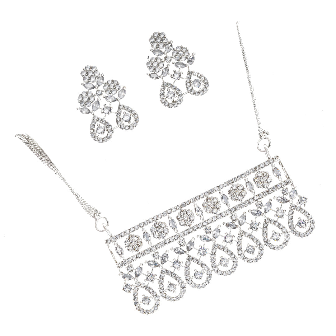 Festive silver zircon pendant set with matching earrings, offering refined elegance and luxury.