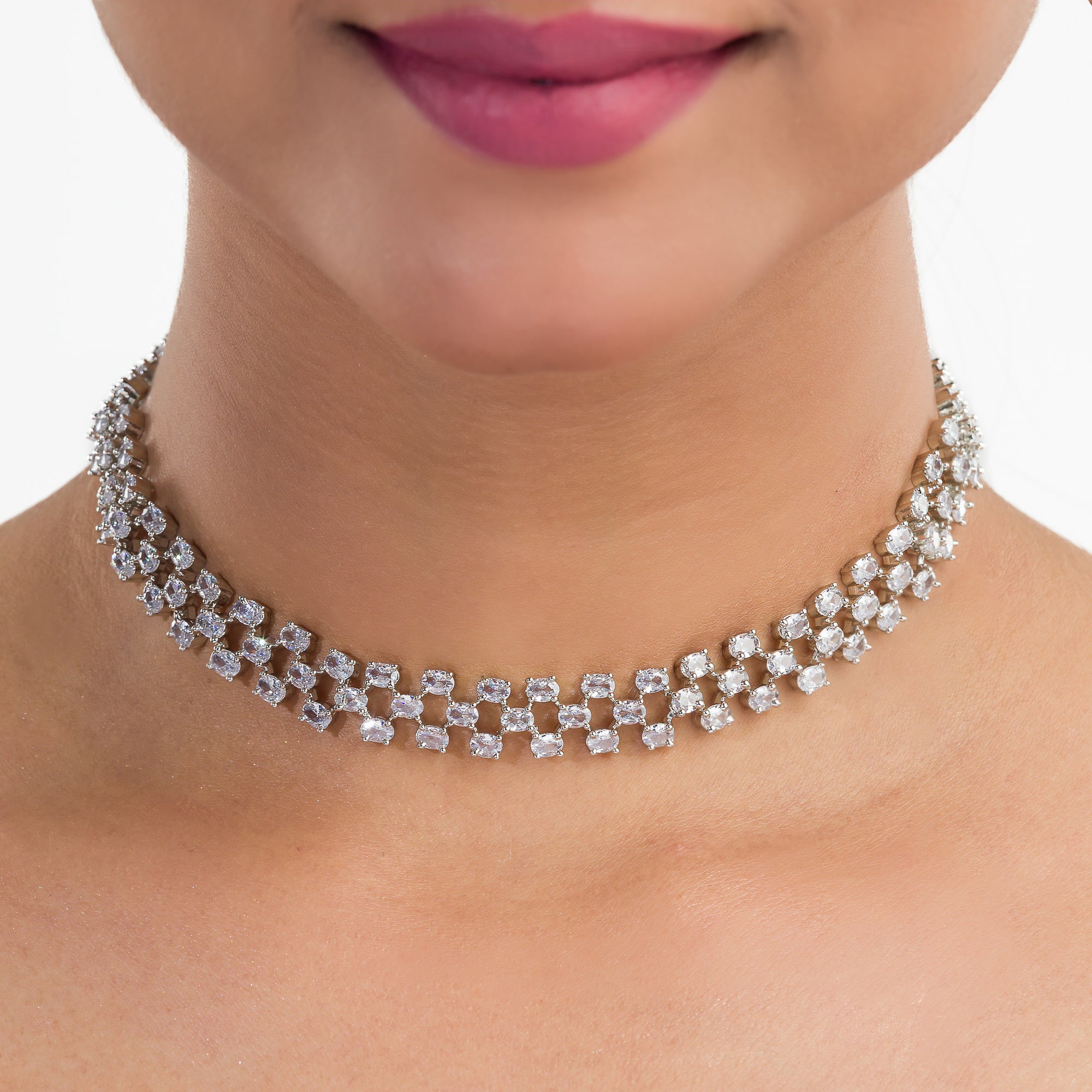 Zircon-studded silver necklace set with exquisite sparkle and sophistication for parties.