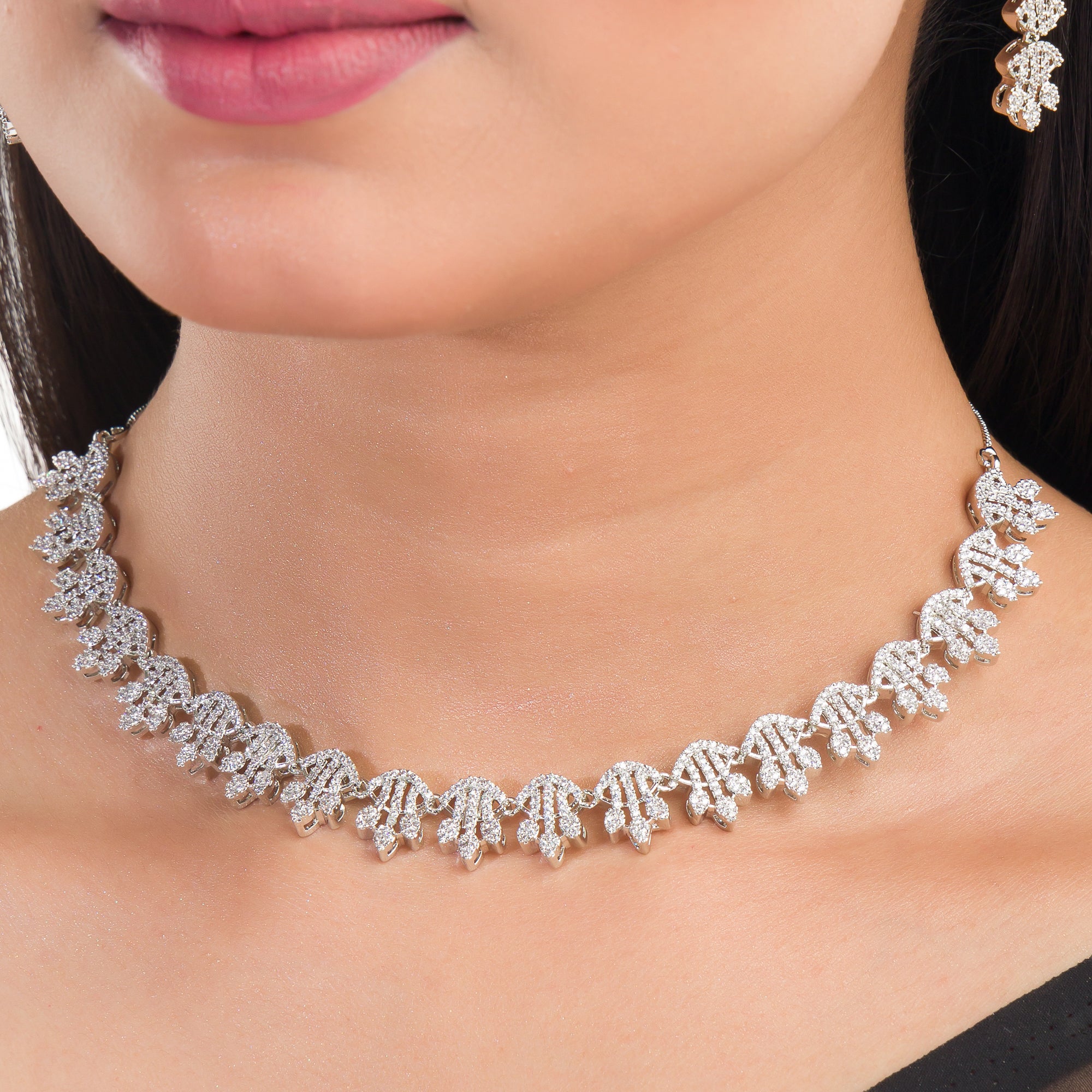 White zircon short necklace set with matching earrings, exuding timeless elegance.
