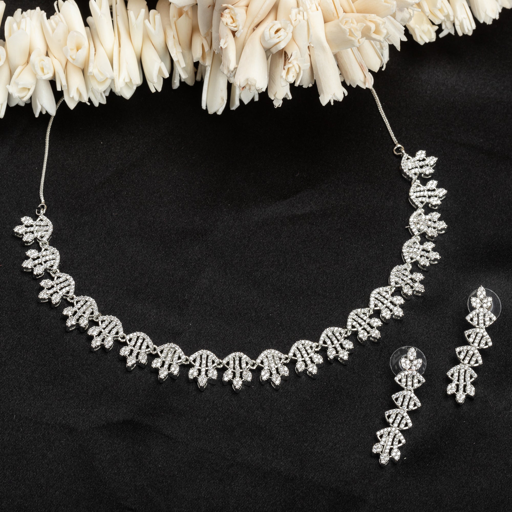 White zircon short necklace set with matching earrings, exuding timeless elegance.