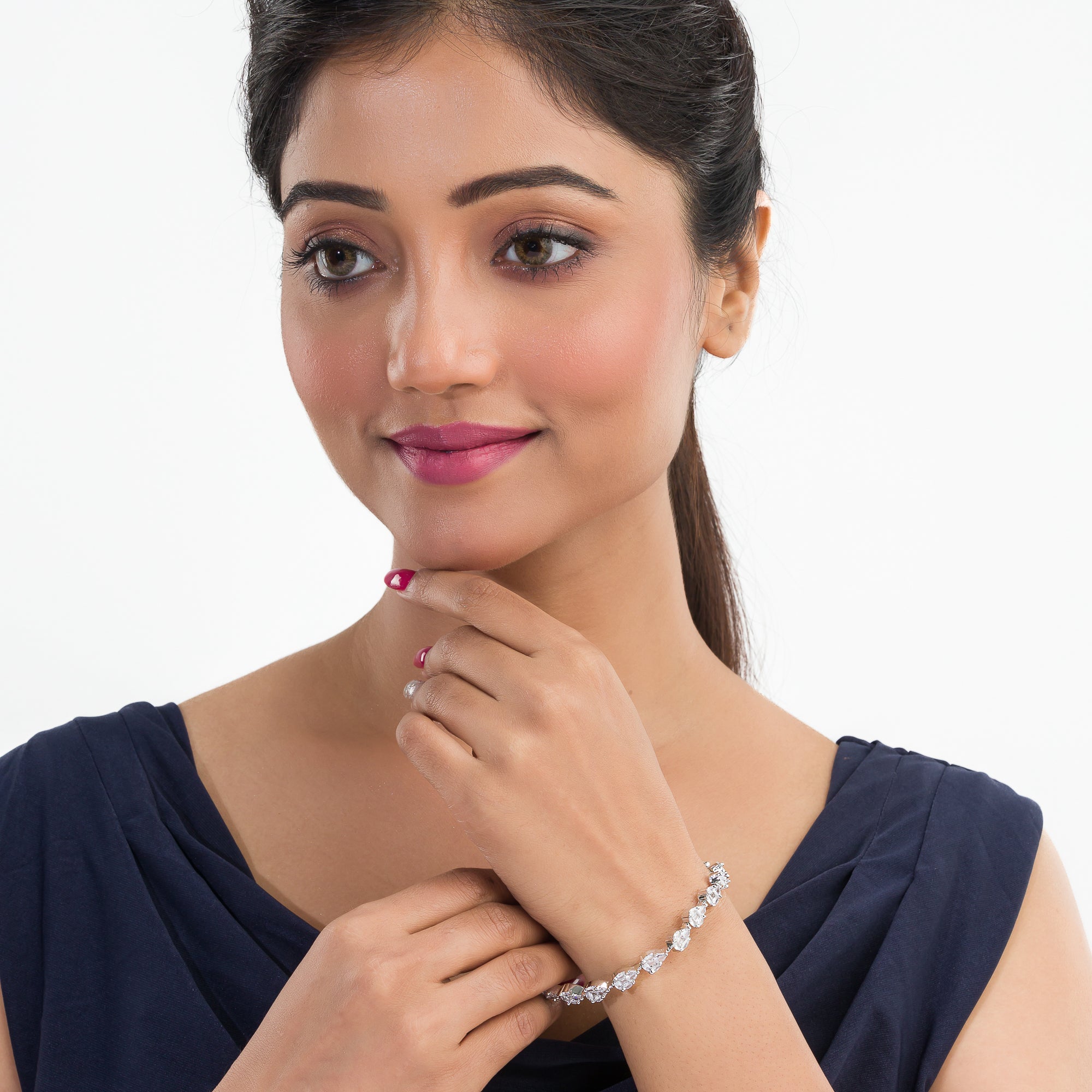 Silver zircon-studded chain bracelet, perfect for adding shimmer to your party wear.