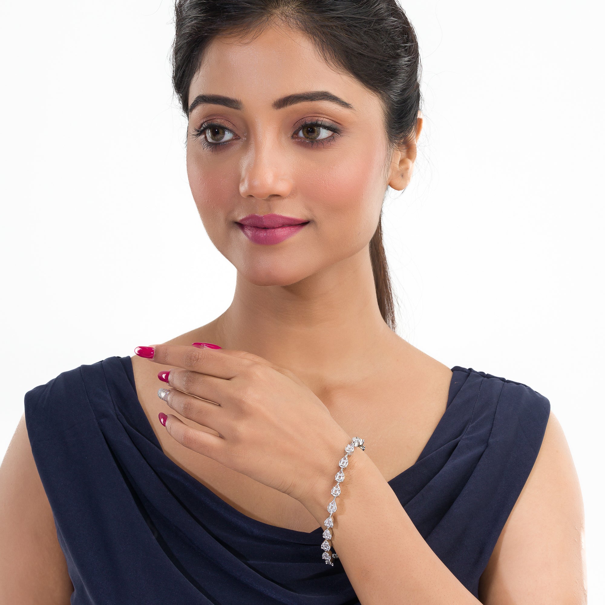 Silver zircon-studded chain bracelet, perfect for adding shimmer to your party wear.