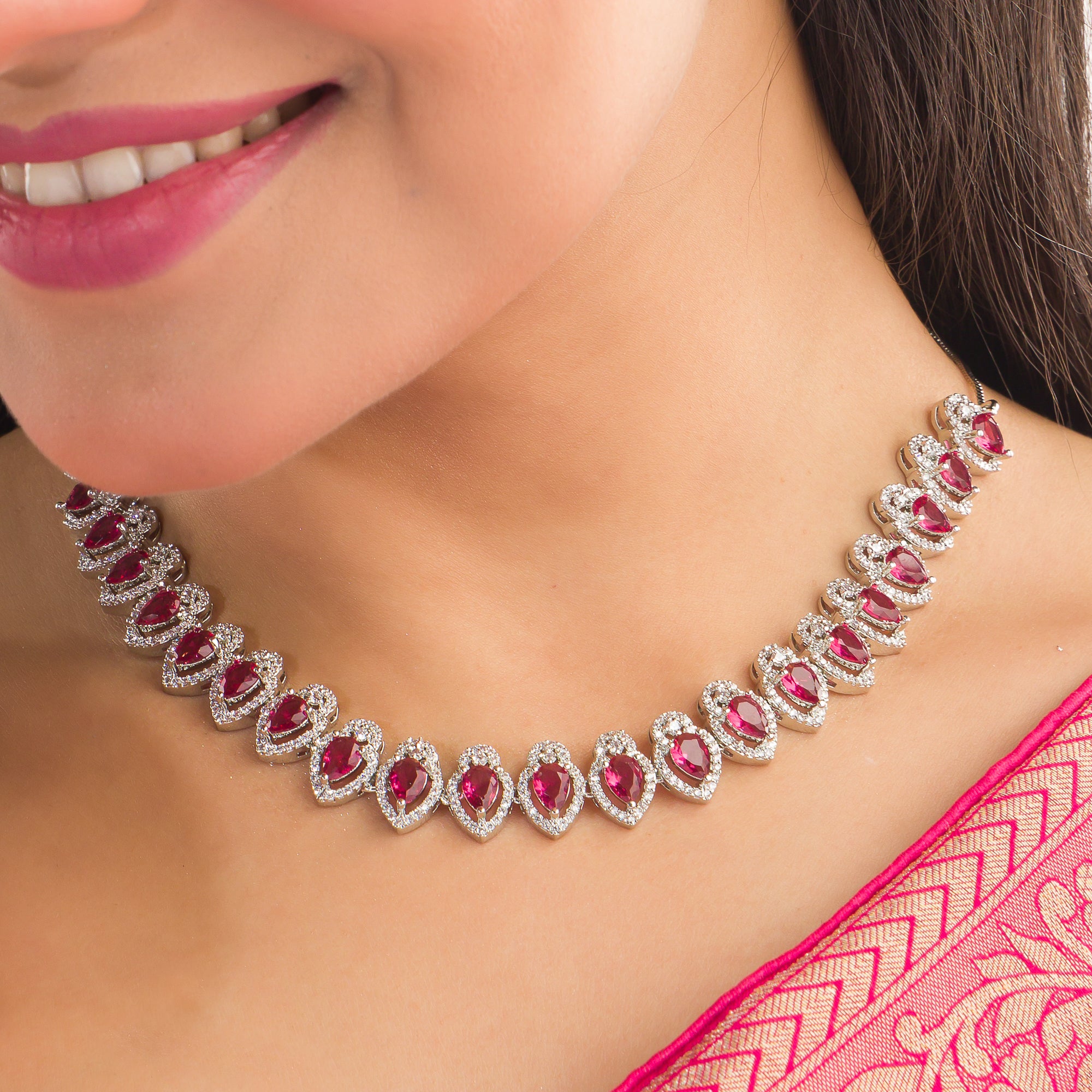 Red stone zircon necklace set, a bold and vibrant choice for striking party elegance.
