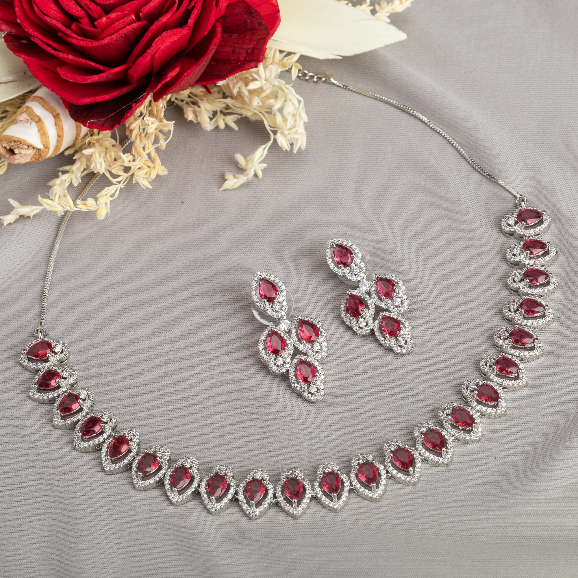Red stone zircon necklace set, a bold and vibrant choice for striking party elegance.