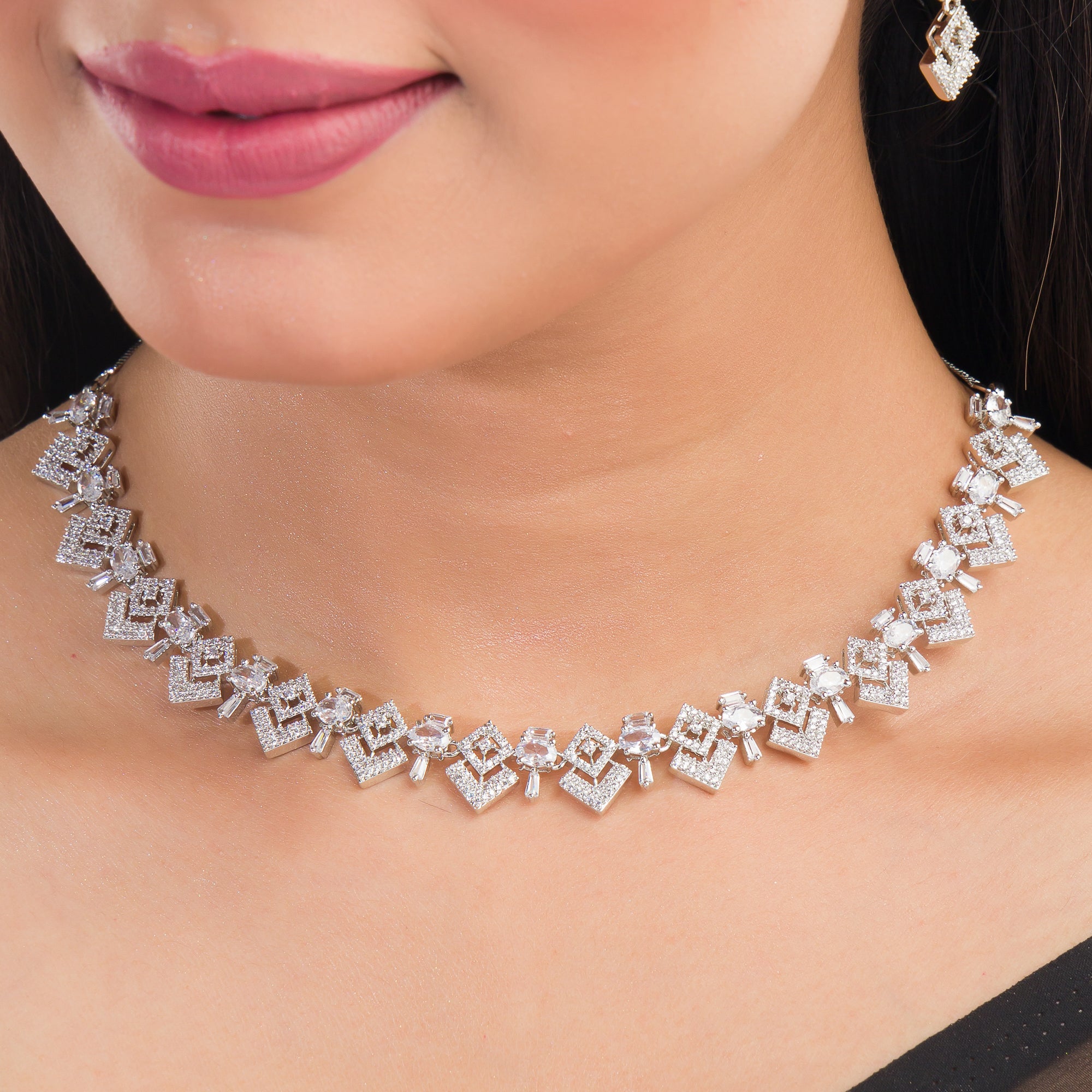 White zircon necklace set with timeless sparkle, adding a refined elegance to your party look.