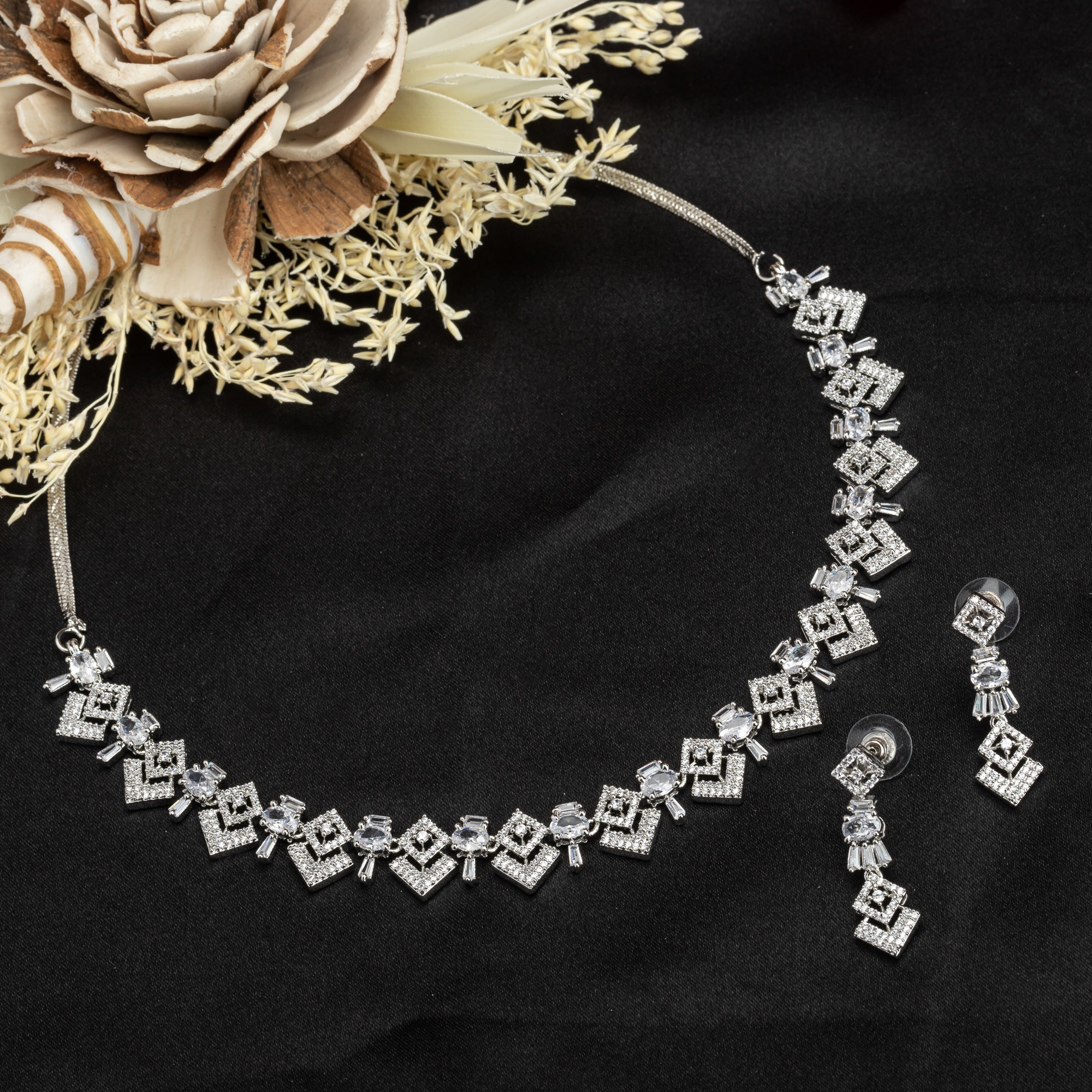 White zircon necklace set with timeless sparkle, adding a refined elegance to your party look.
