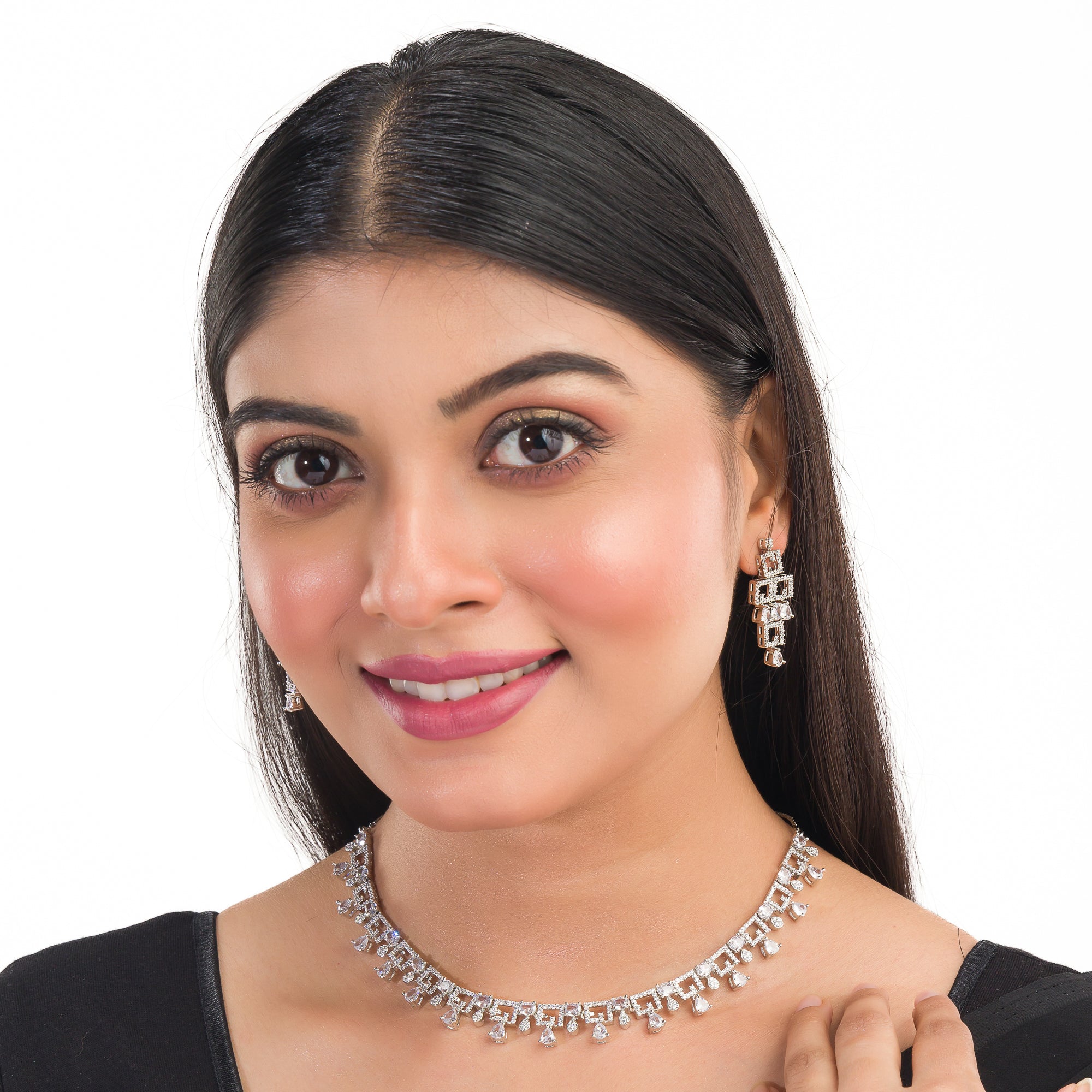 White zircon necklace set exudes elegance, featuring sparkling stones for a refined party look.