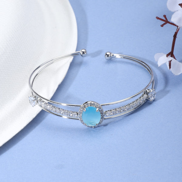Aqua zircon bracelet sparkles with vibrant stones, ideal for adding a fresh, stylish touch to parties.